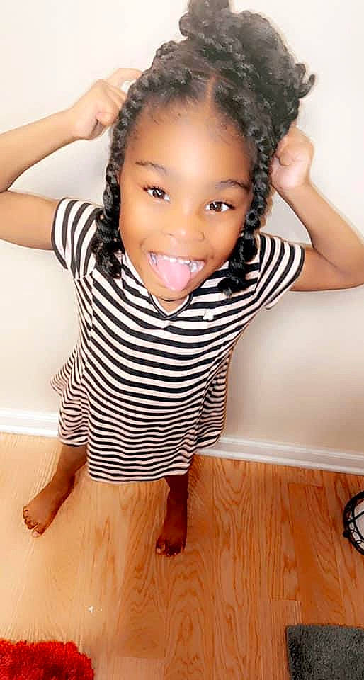 Kendra is registered to the contest to win money with this photo: arm, baby_toddler_clothing, black, cheek, chin, face, flash_photography, gesture, hair, hairstyle, happy, head, human_body, joint, joy, leg, lip, neck, person, skin