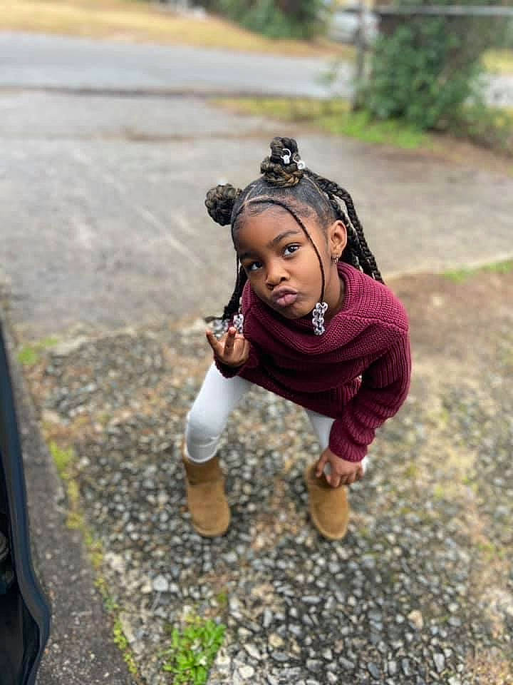 Kendra is registered to the contest to win money with this photo: asphalt, child, fawn, fun, grass, happy, leisure, people_in_nature, person, personal_protective_equipment, plant, recreation, road, shadow, sidewalk, sitting, soil, street_fashion, toddler, tree