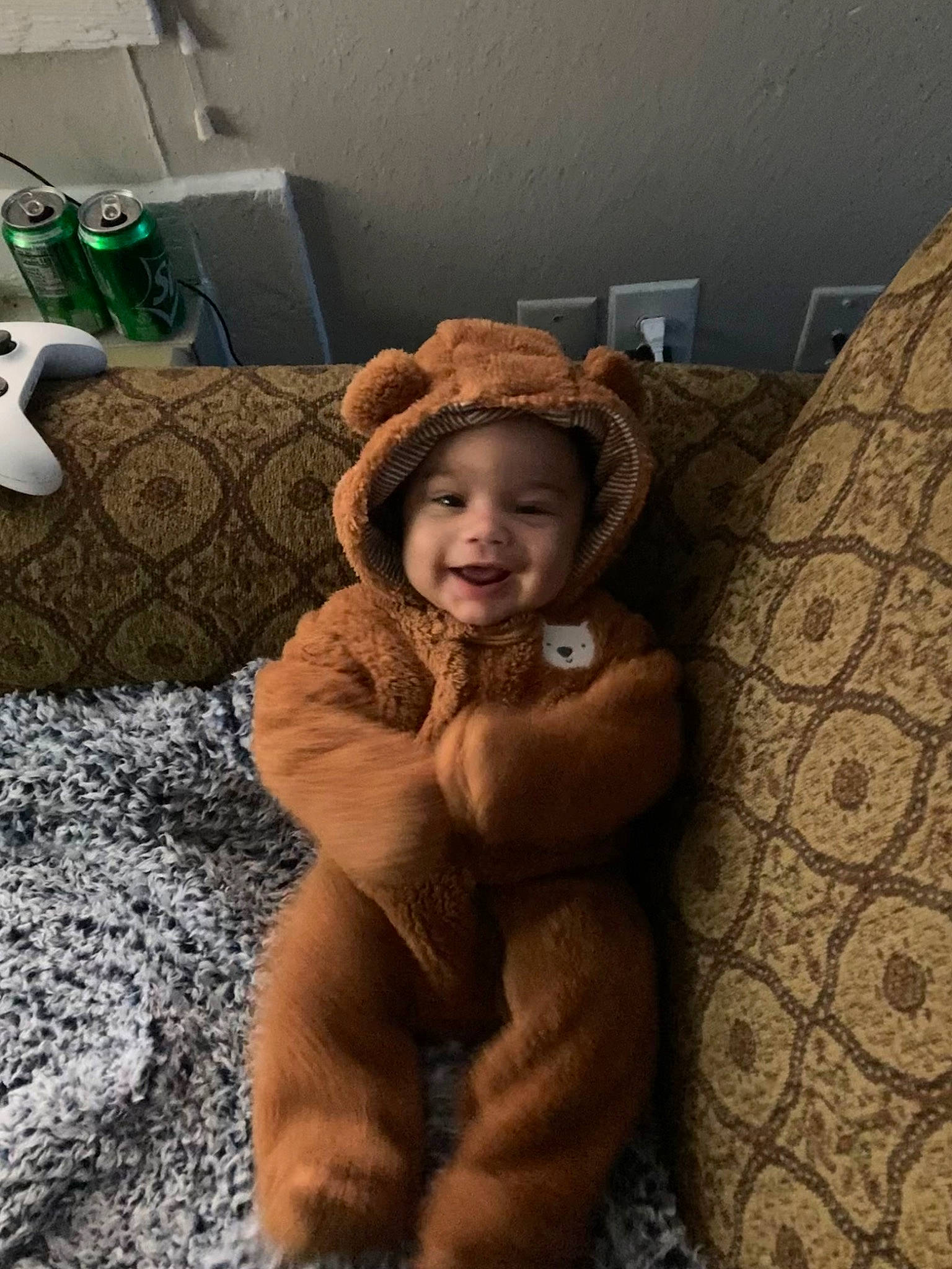 Kamari joined the competition — help win amazing prizes! baby, child, comfort, eye, face, fawn, floor, flooring, fun, fur, happy, head, headwear, joy, living_room, person, room, selfie, sitting, smile