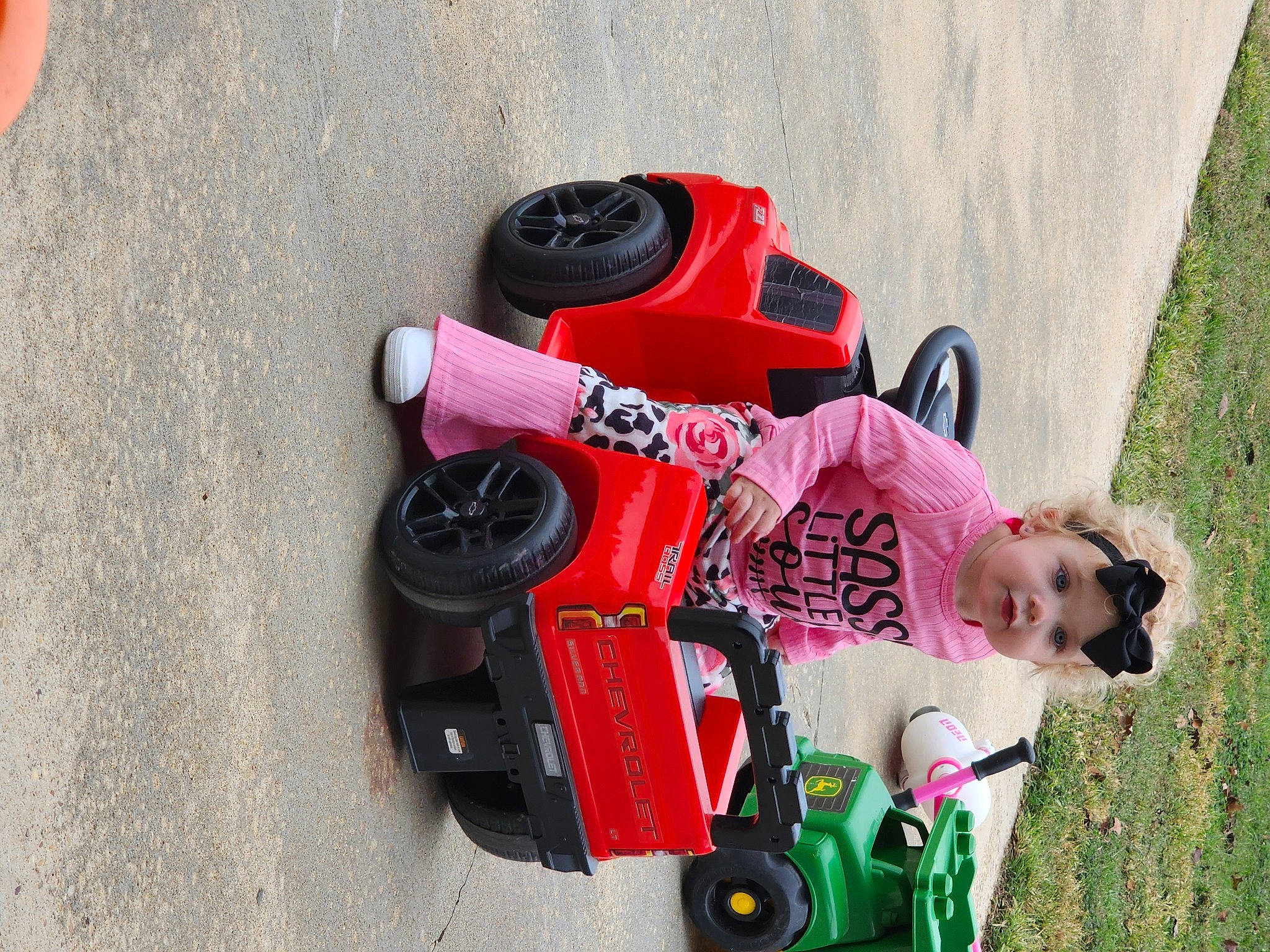 Libby joined the competition — help win amazing prizes! auto_part, automotive_design, automotive_exterior, automotive_lighting, automotive_tire, automotive_wheel_system, carmine, headwear, magenta, motor_vehicle, motorsport, person, personal_protective_equipment, plant, race_car, race_track, racing, riding_toy, tire, toddler