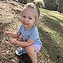 Leilani is registered to the contest to win money with this photo: child, toddler, girl, smile, pony_tail, outdoors, park, trees, pine_needles, grass, sandals, purple_shorts, blue_shirt, playing, crouching, sunlight, nature, happy, portrait, casual_clothing