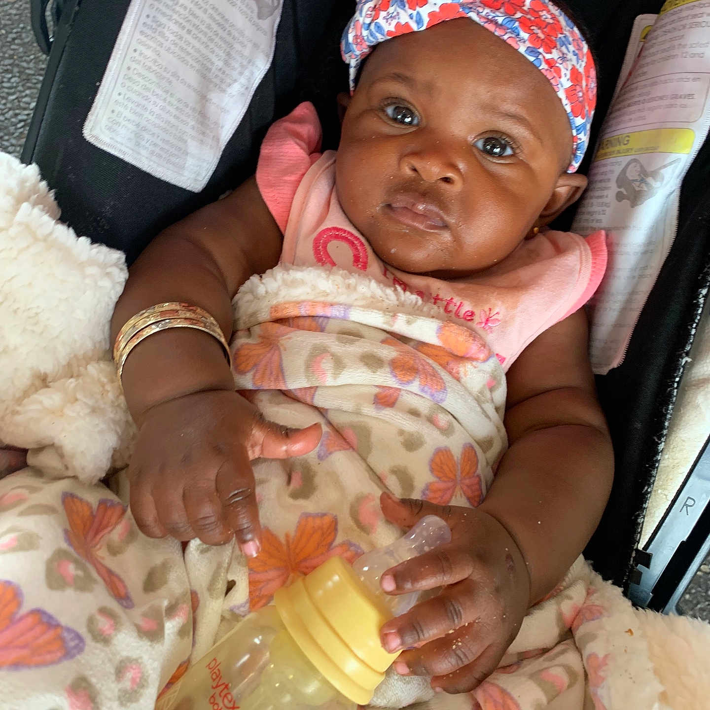 Treasure joined the competition — help win amazing prizes! accessory, baby, blanket, bottle, car_seat, child, clothing, cute, feeding, headband, holding, indoor, infant, orange, pattern, person, pink, sitting, soft, young_child