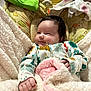baby, babylaughing, blanket, crib, face, furniture, happy, head, infantbed, newborn, person, photography, portrait, quilt, sleeping, smile