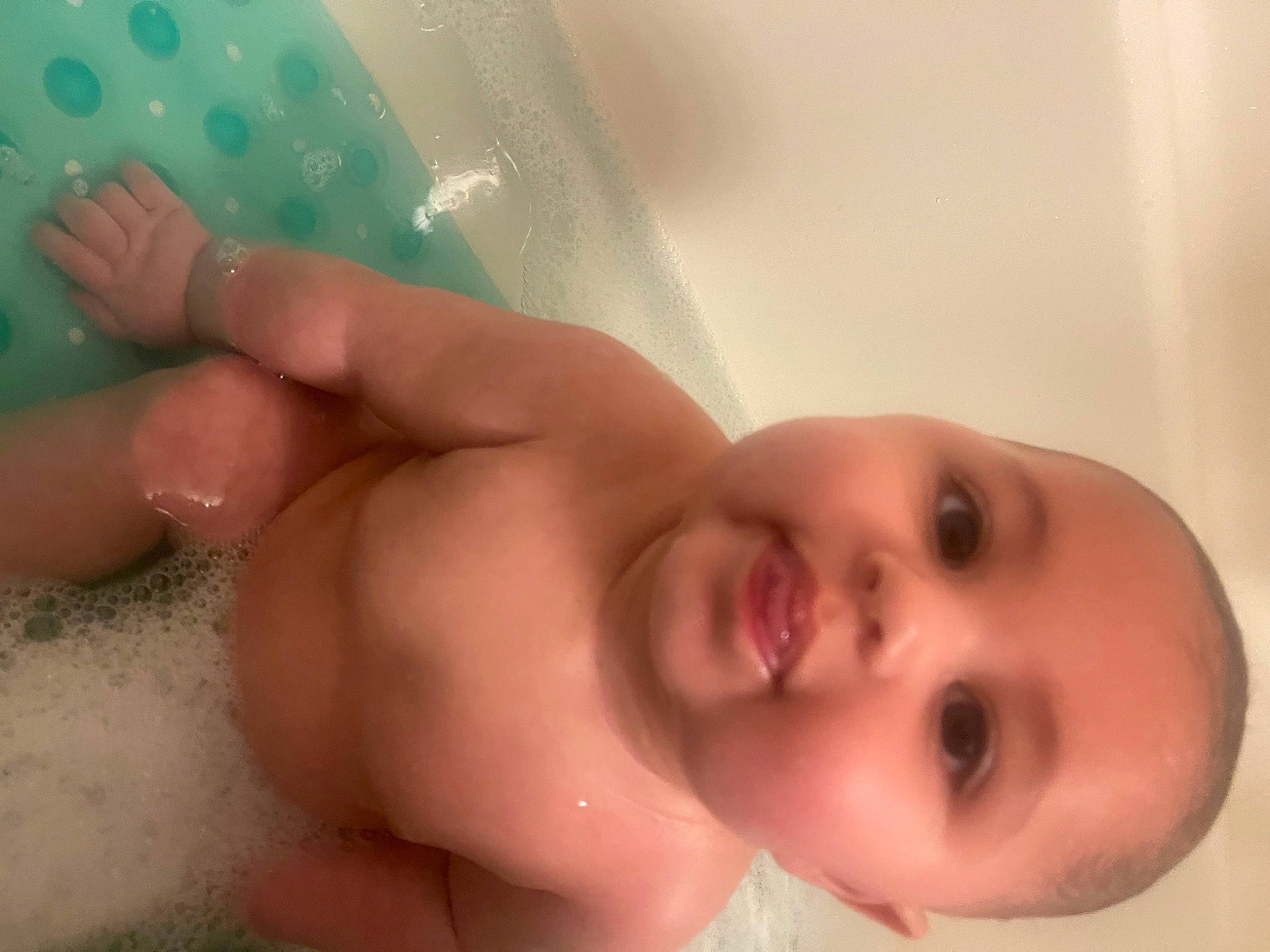 Montgomery is registered to the contest to win money with this photo: baby, baby_bathing, bathing, bathroom, bathtub, cheek, ear, eye, eyebrow, eyelash, finger, fluid, iris, lip, mouth, nose, person, skin, smile, toddler