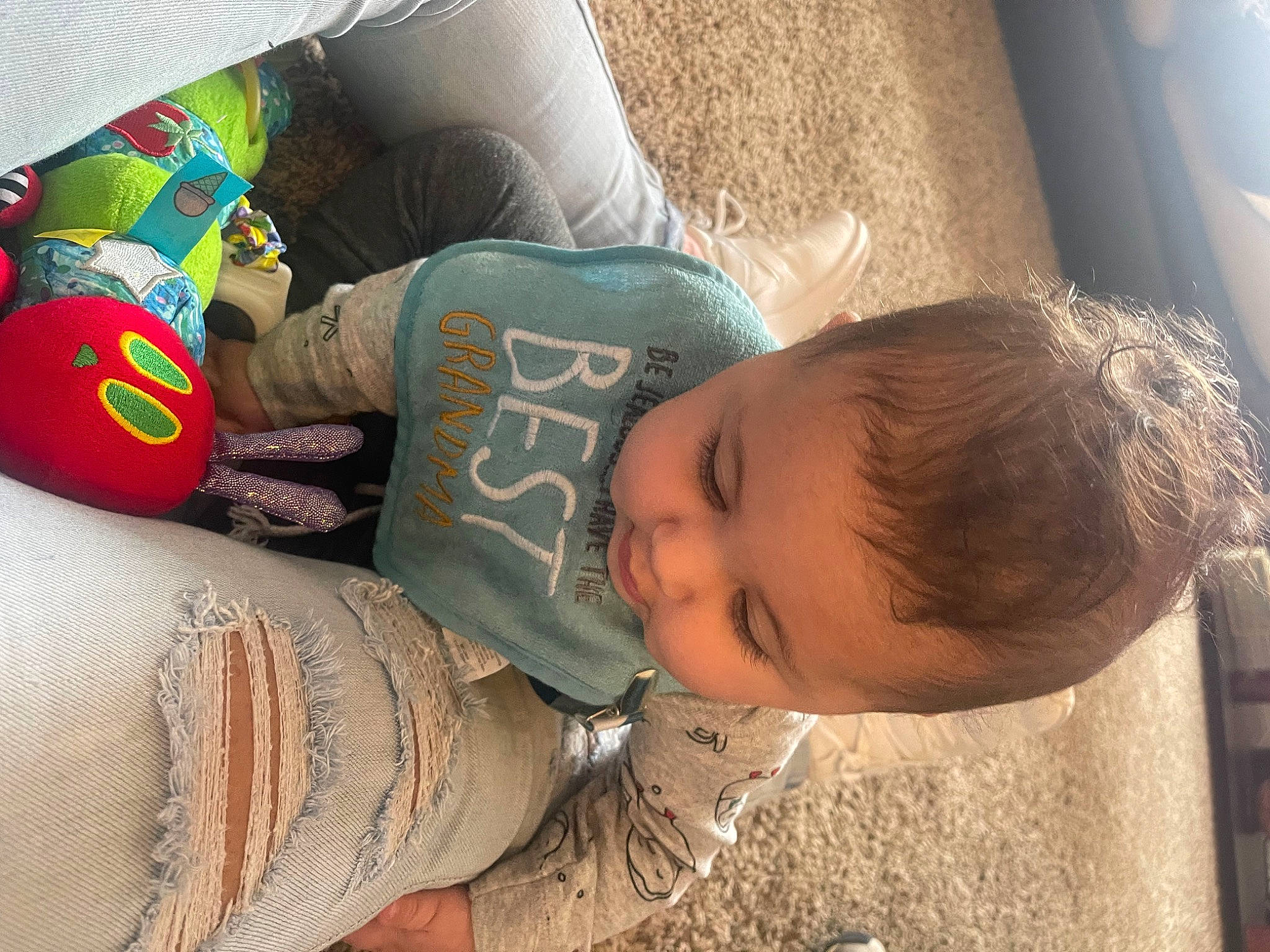 Montgomery is registered to the contest to win money with this photo: baby, baby_toddler_clothing, cheek, child, comfort, couch, fun, happy, linens, nap, pattern, person, play, sitting, skin, sleep, sleeve, smile, toddler, tree