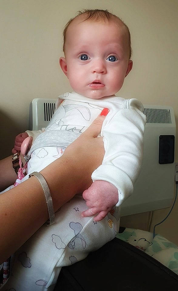 Lois is registered to the contest to win money with this photo: arm, baby, baby_products, baby_toddler_clothing, cheek, child, finger, hand, joint, leg, person, product, skin, thumb, toddler