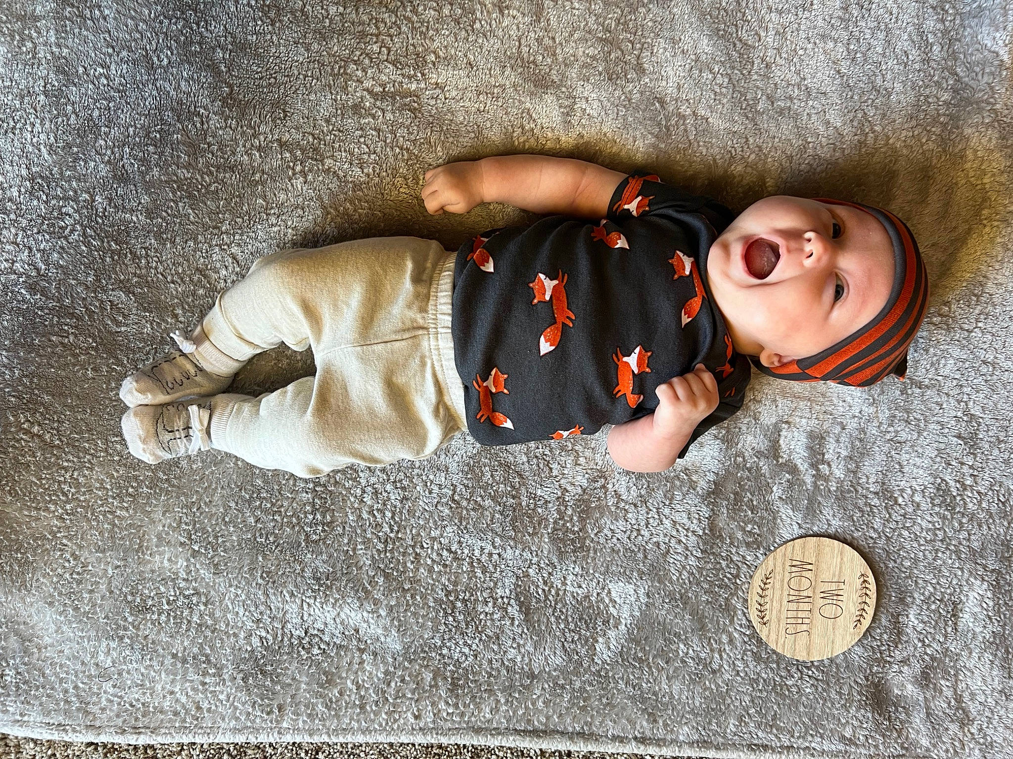 Kolson is registered to the contest to win money with this photo: baby, baby_toddler_clothing, carmine, child, comfort, eyewear, flash_photography, flooring, fun, grey, headgear, headwear, linens, pattern, person, personal_protective_equipment, room, sitting, sleep, sleeve