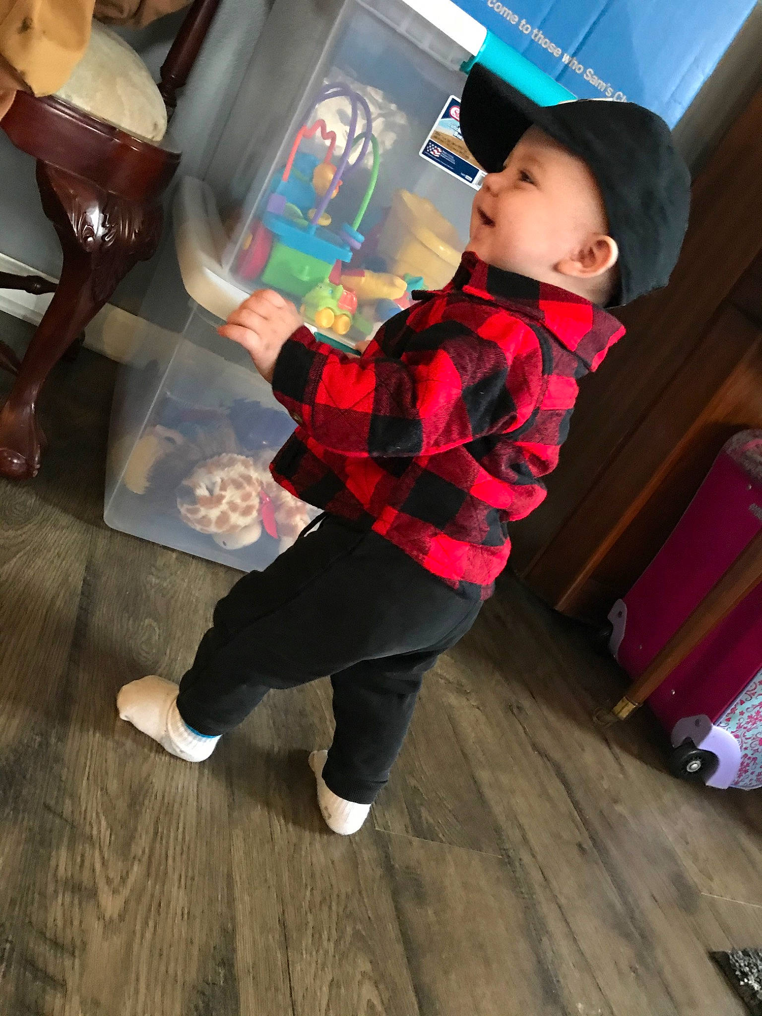 Atreus is registered to the contest to win money with this photo: child, flooring, fun, headwear, magenta, person, play, shoe, standing, toddler