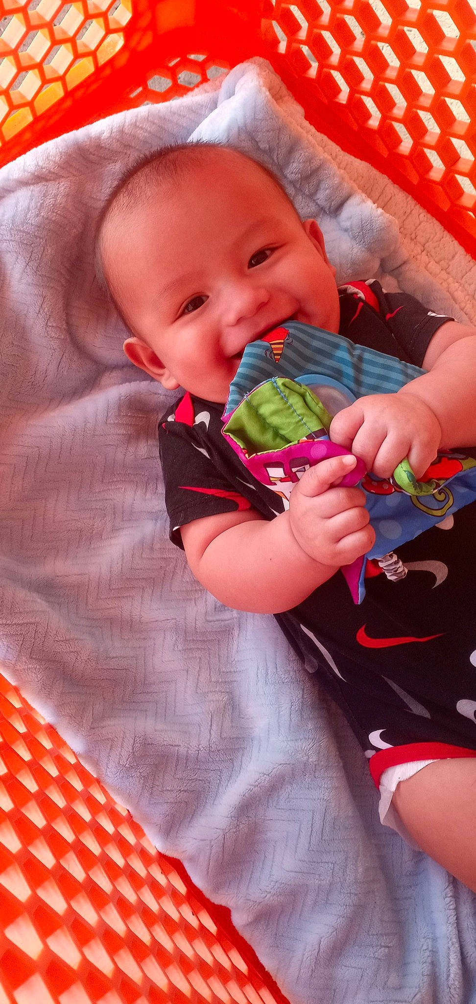 Gianni joined the competition — help win amazing prizes! baby, baby_products, baby_toddler_clothing, cheek, child, comfort, fun, grass, happy, joy, linens, nail, orange, pattern, person, pink, red, sitting, skin, sleeve