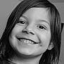 black_and_white, casual, cheeks, child, closeup, cute, dimples, eyebrows, face, hair, happy, indoor, person, portrait, shirt, smile, teeth, text_on_clothing, young, youth