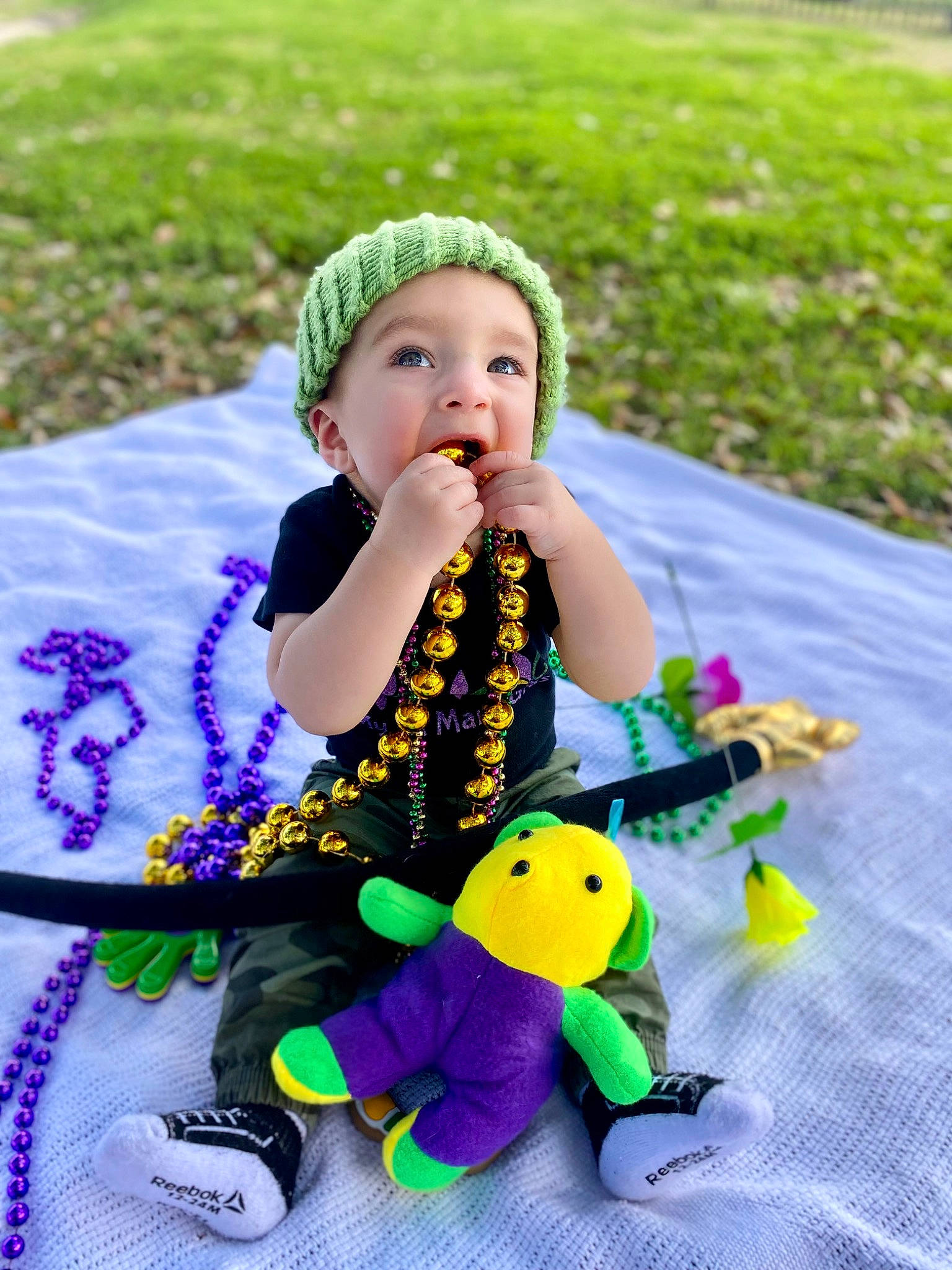 John joined the competition — help win amazing prizes! baby, baby_toddler_clothing, child, fun, grass, green, happy, headwear, leisure, musical_instrument, people_in_nature, person, photograph, plant, play, product, purple, recreation, sitting, snapshot