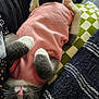 blanket, cat, cozy, cute, domestic_animal, feline, fur, indoors, kitten, nap, paws, pet, pillow, pink_shirt, relaxing, resting, sleeping, soft, textile, whiskers