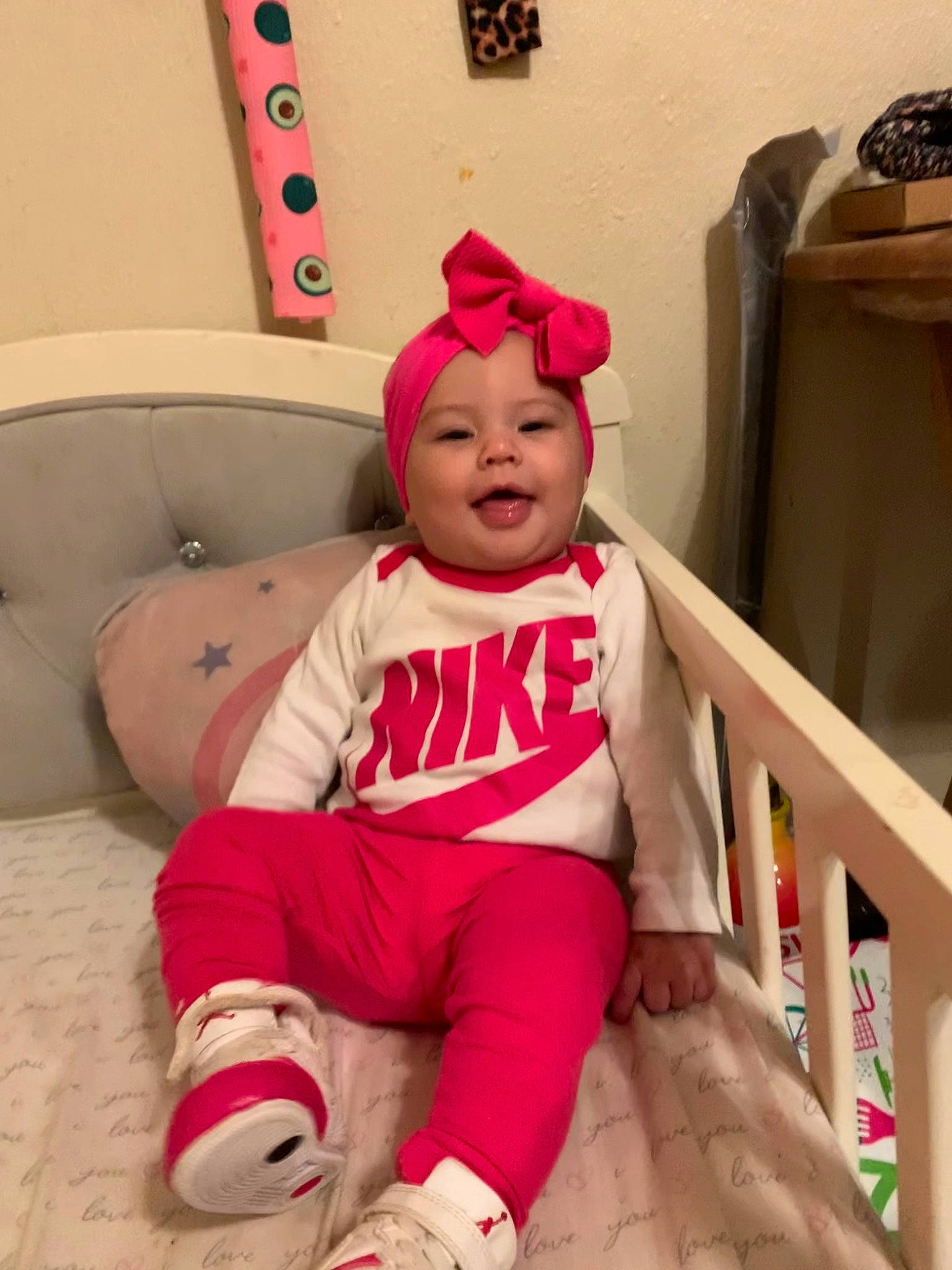 Layla Rose joined the competition — help win amazing prizes! baby, baby_toddler_clothing, chair, comfort, costume_hat, couch, event, fun, happy, headwear, holiday, human_leg, knee, lap, leg, person, pink, shorts, sock, t_shirt