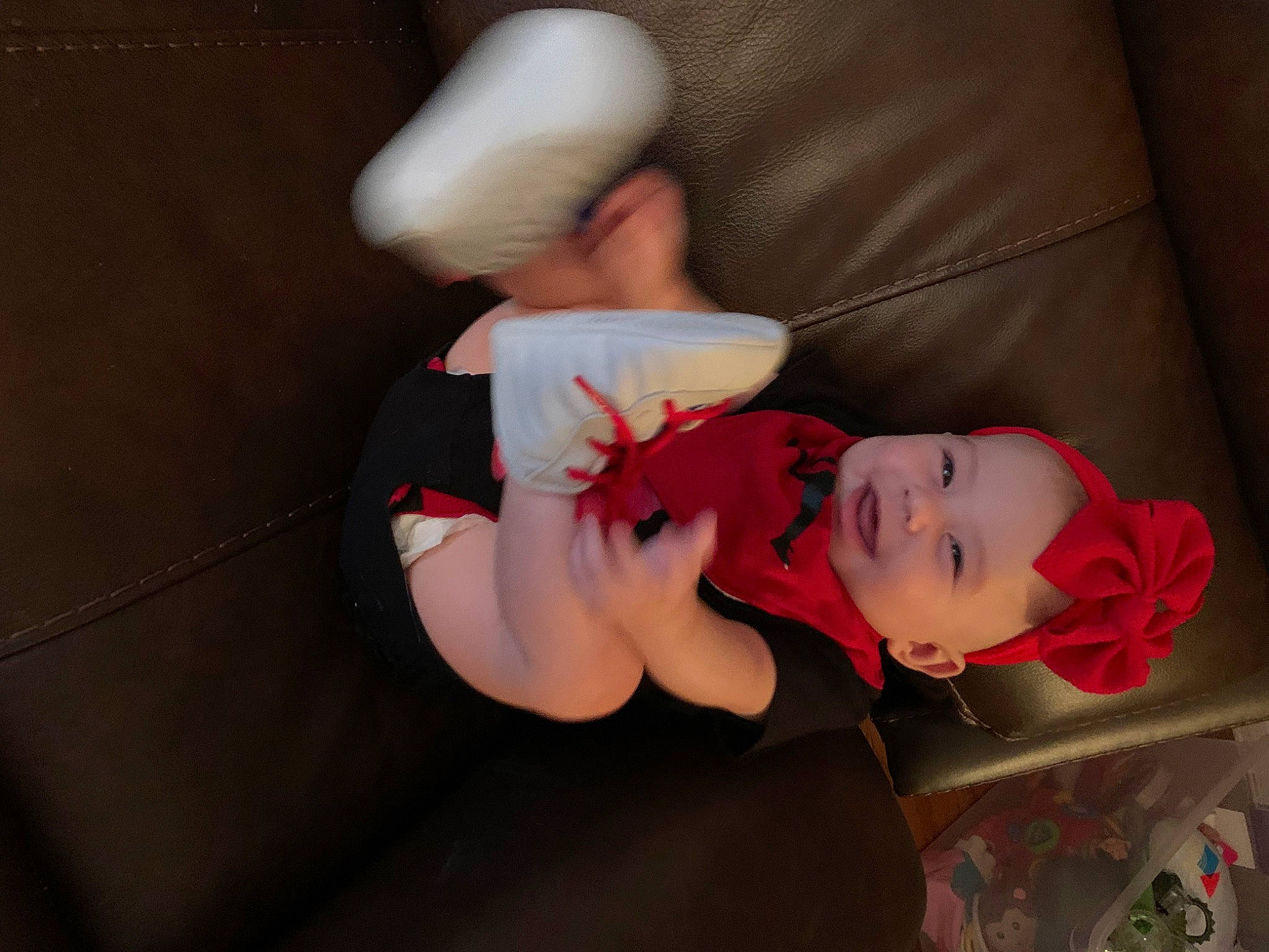 Layla Rose is registered to the contest to win money with this photo: abdomen, carmine, chest, child, comfort, elbow, flesh, gesture, headgear, human_body, human_leg, knee, leg, lip, nail, person, skin, sleeve, thigh, trunk