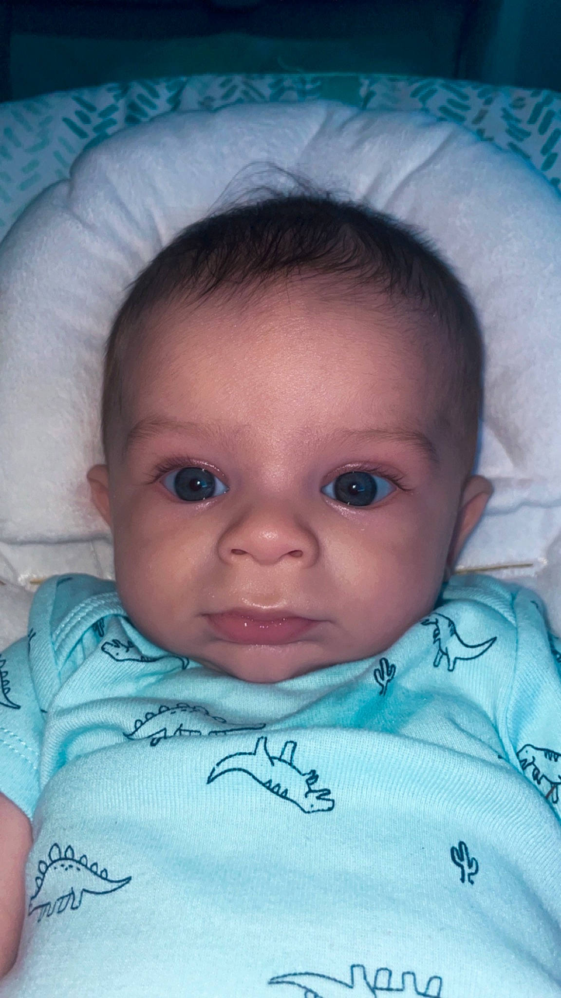 Jackson is registered to the contest to win money with this photo: azure, baby, blue, cheek, chin, eye, eyebrow, eyelash, face, forehead, head, human_body, iris, lip, mouth, nose, organ, person, skin, sleeve