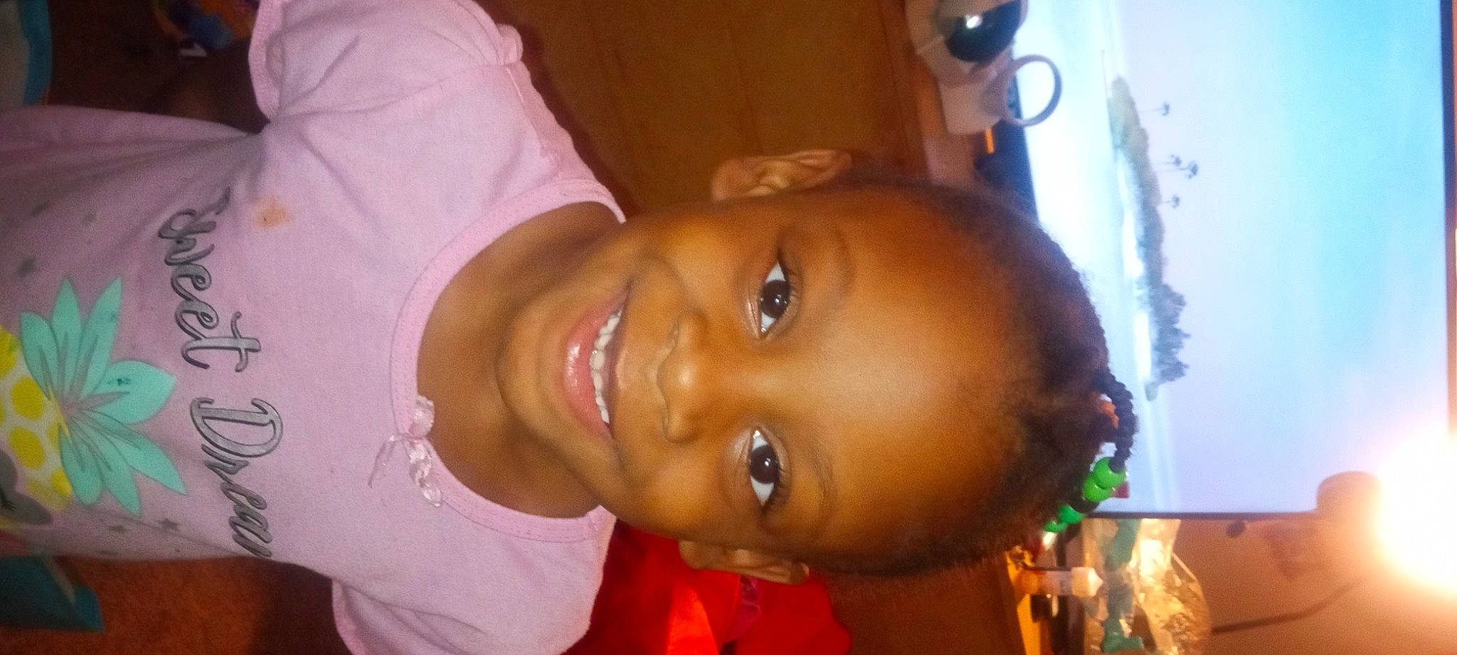 Eva is registered to the contest to win money with this photo: baby, black_hair, cheek, chest, child, ear, event, eyebrow, eyelash, forehead, fun, happy, joy, lip, mouth, nose, person, skin, smile, t_shirt