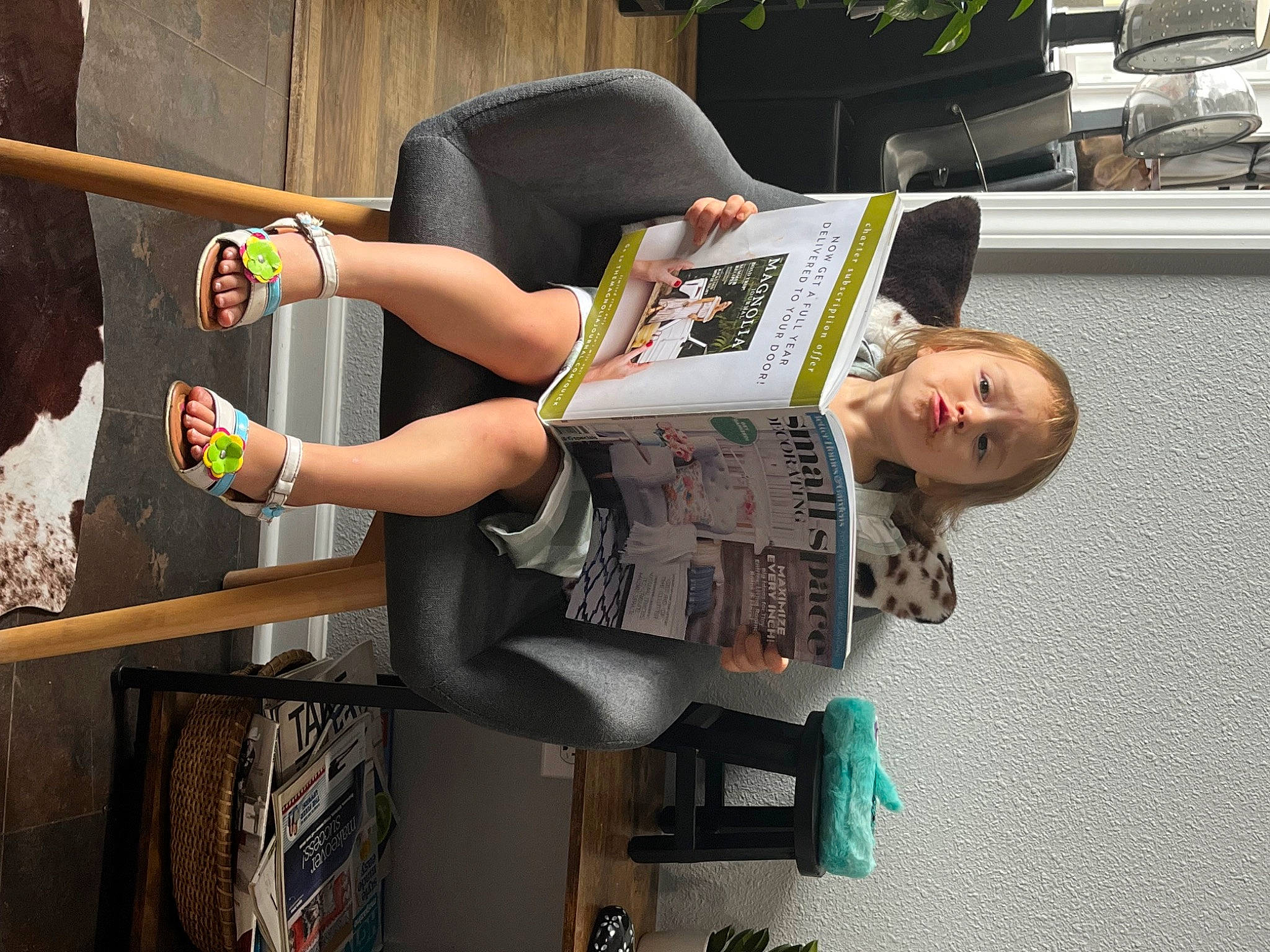 Angelique joined the competition — help win amazing prizes! art, chair, comfort, fun, human_leg, knee, person, publication, reading, room, sandal, shelf, shelving, sitting, t_shirt, thigh, visual_arts