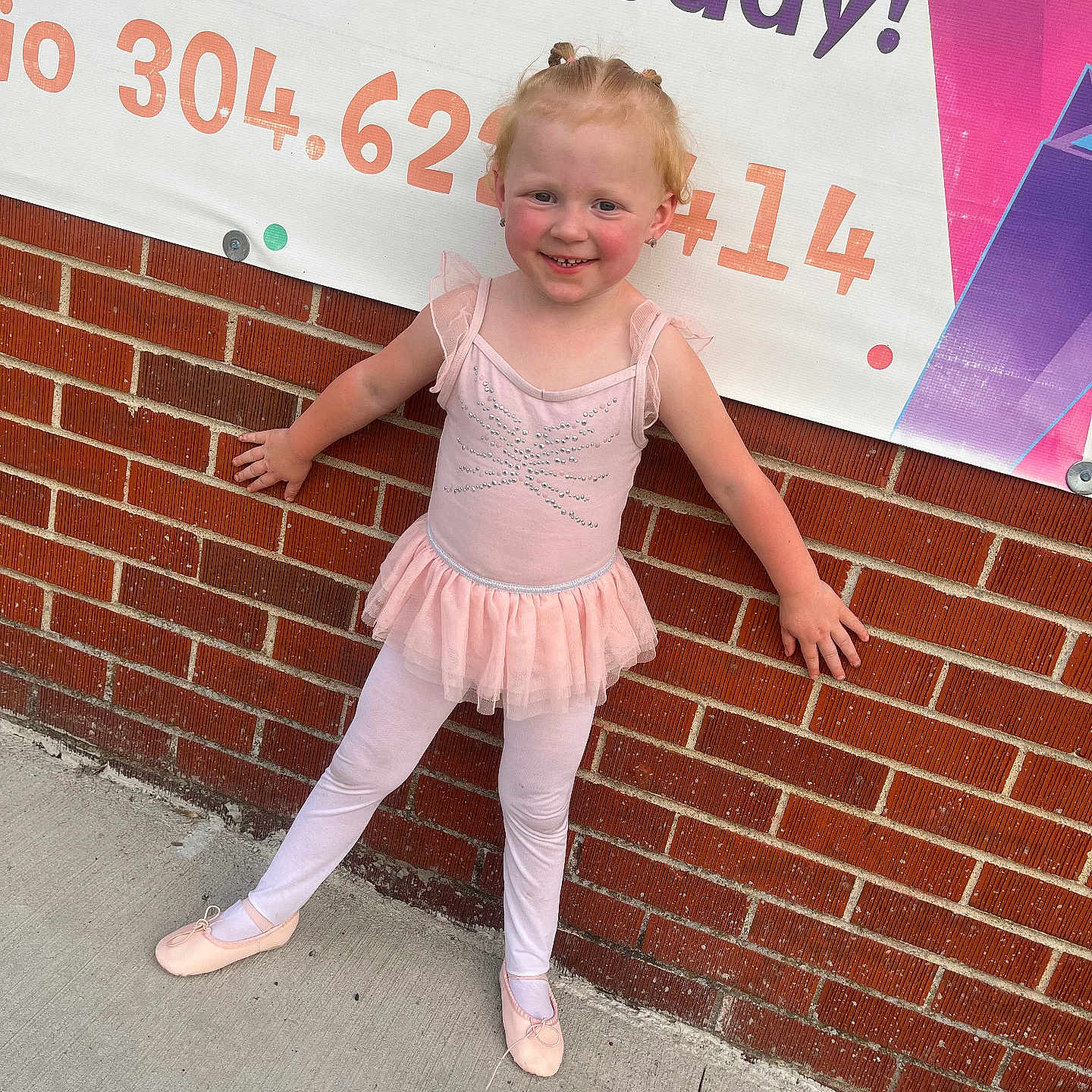 Natalie joined the competition — help win amazing prizes! advertisement, brick, child, city, clothing, costume, dancing, face, female, footwear, girl, head, leisureactivities, pants, person, photography, portrait, shoe, sitting, skirt