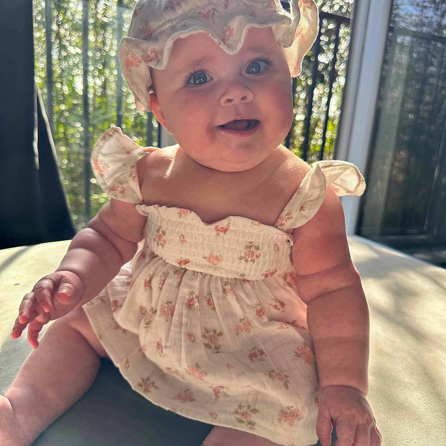 Daisy joined the competition — help win amazing prizes! accessories, baby, bodypart, bonnet, cap, clothing, costume, dress, face, finger, hand, happy, hat, head, person, photography, plant, portrait, sitting, smile