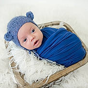 Bennett joined the competition — help win amazing prizes! baby, newborn, blue_hat, knitted_hat, bear_ears, blue_wrap, wooden_bowl, fluffy_blanket, white_fabric, cute, infant, portrait, child, soft_texture, sleeping_area, cozy, wrapped, newborn_photography, studio_photo, adorable