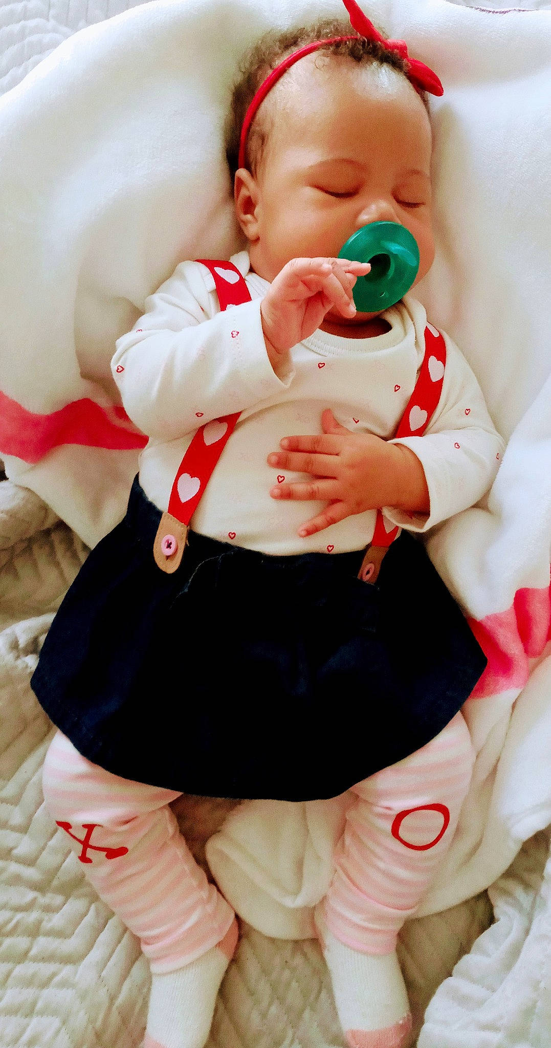 Kenedi joined the competition — help win amazing prizes! baby, baby_toddler_clothing, bow_tie, child, drinkware, event, finger, gesture, hand, happy, human_leg, joint, person, pink, red, skin, sleeve, thigh, thumb, toddler