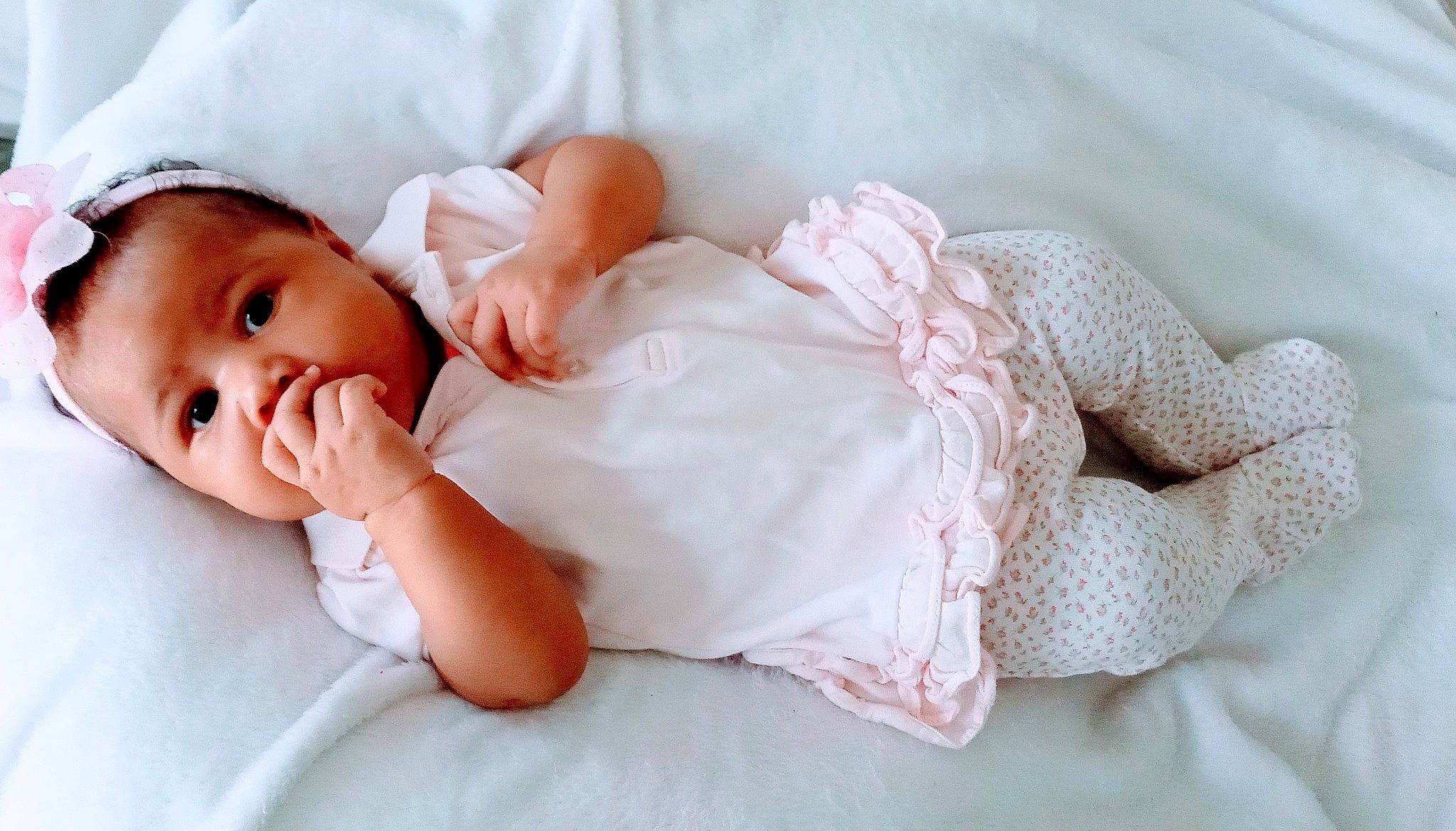 Kenedi is registered to the contest to win money with this photo: arm, baby, baby_sleeping, baby_toddler_clothing, cheek, child, comfort, eyelash, finger, flash_photography, hand, hat, headgear, human_body, linens, lip, person, pink, skin, textile