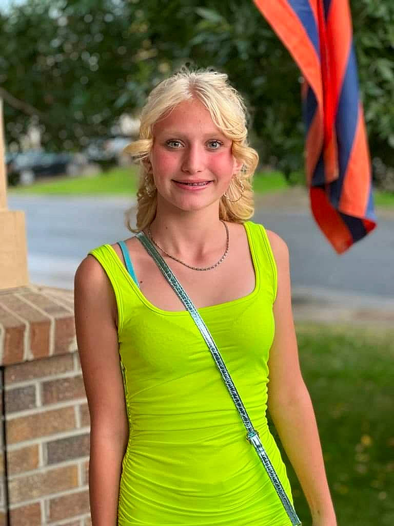 Tori joined the competition — help win amazing prizes! abdomen, chest, electric_blue, event, flag, fun, grass, happy, head, jewellery, joy, leisure, necklace, people_in_nature, person, pole, sleeveless_shirt, smile, summer, t_shirt