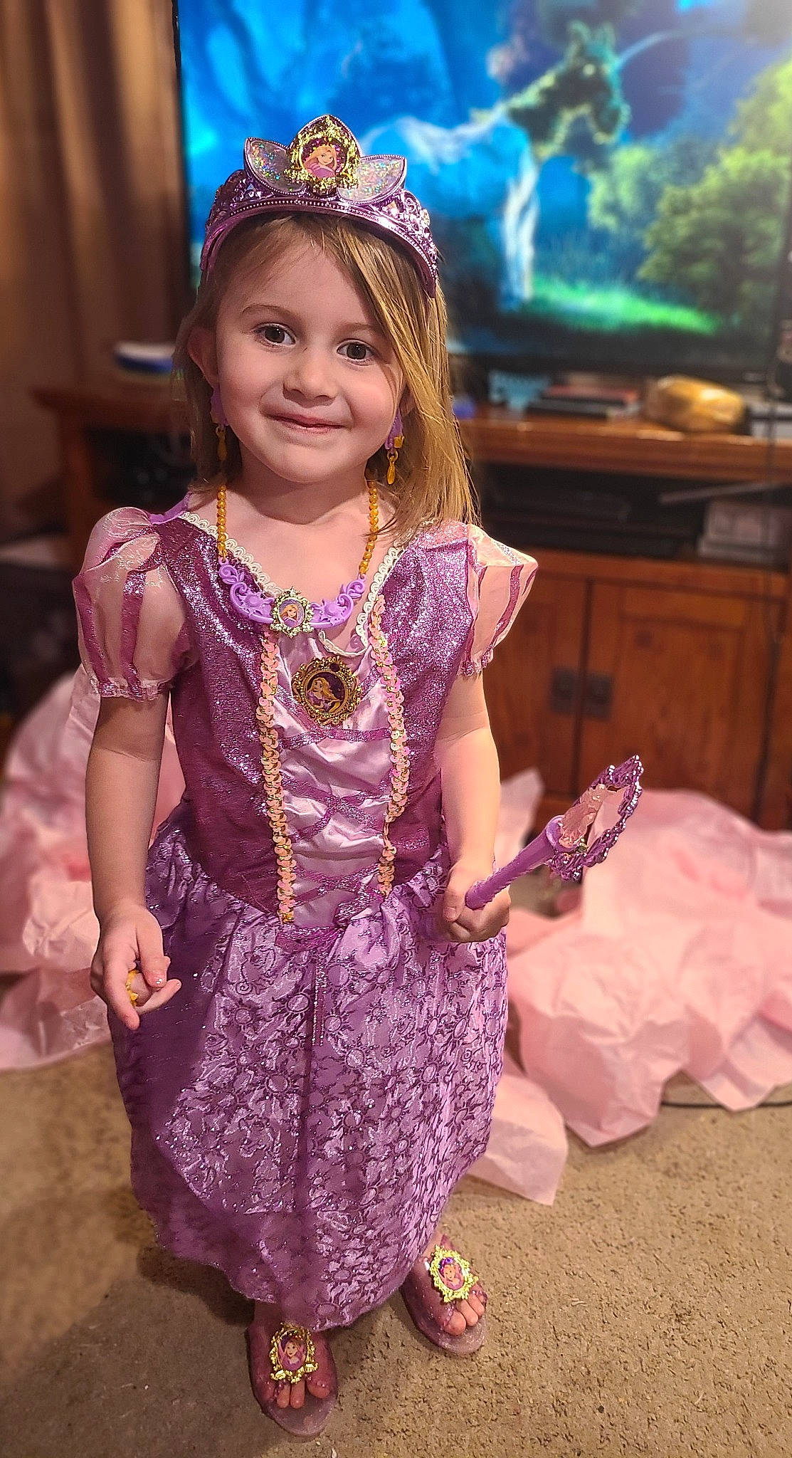 Roxanne is registered to the contest to win money with this photo: baby_toddler_clothing, beauty, child, dress, embellishment, event, facial_expression, fashion, fashion_design, fun, happy, jewellery, joy, magenta, person, pink, purple, smile, snapshot, tiara