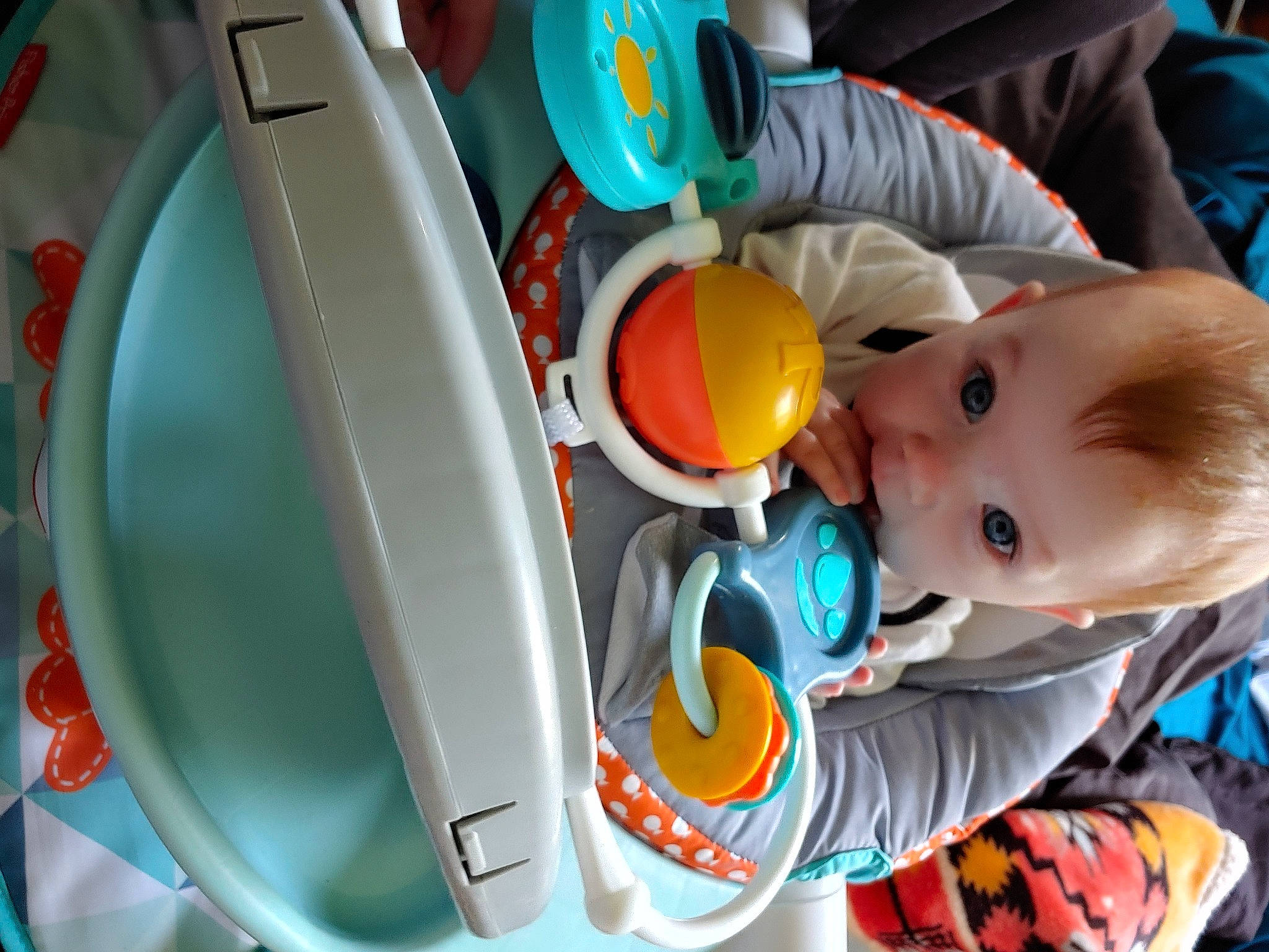 Rosalynne joined the competition — help win amazing prizes! baby, baby_products, baby_toys, blue, chair, child, drinkware, fun, mouth, nose, orange, person, personal_protective_equipment, plastic, play, room, tableware, toddler, toy, white
