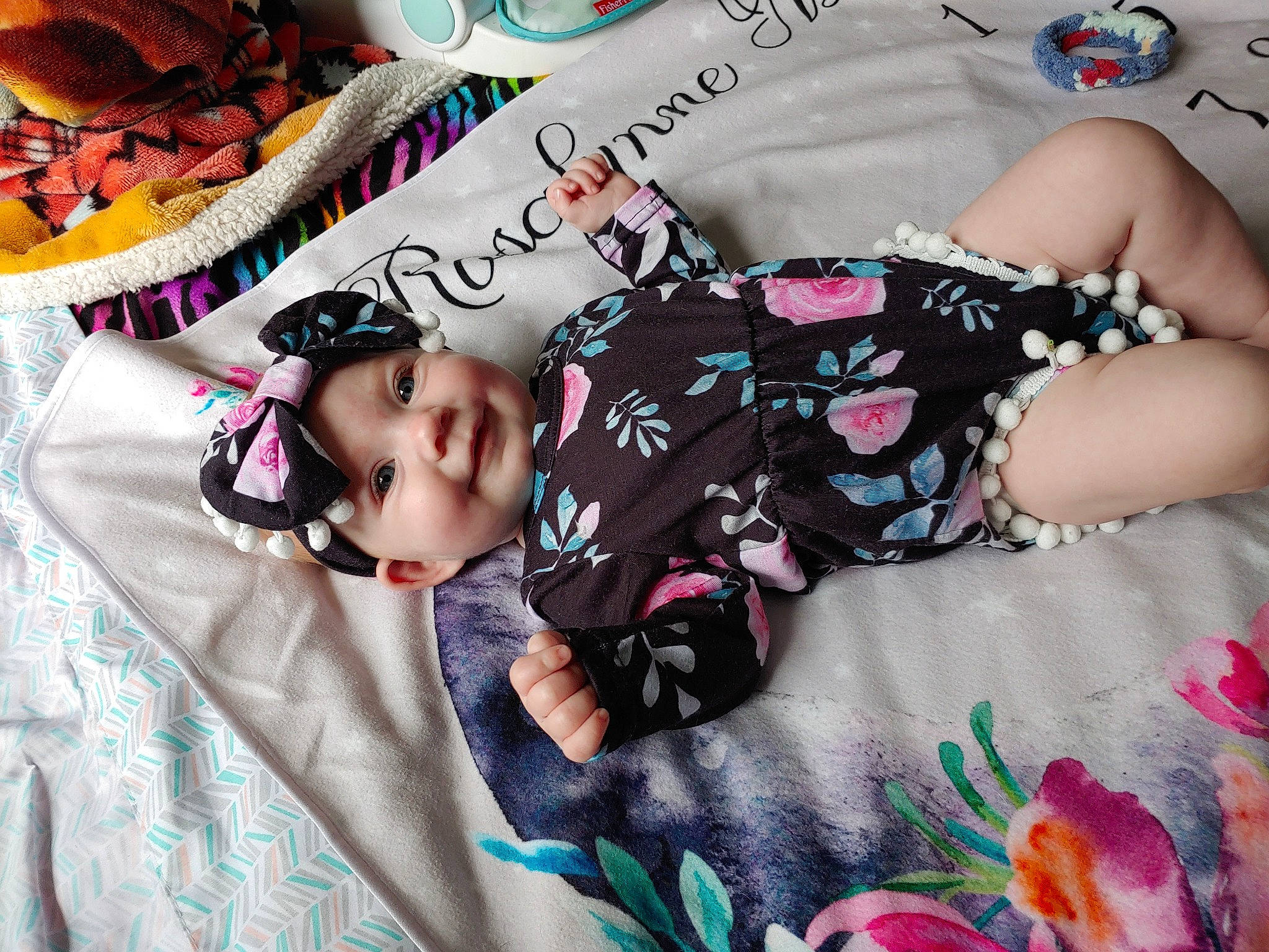 Rosalynne joined the competition — help win amazing prizes! baby, baby_toddler_clothing, child, comfort, cool, eye, face, happy, head, headwear, joy, linens, magenta, pattern, person, pink, product, purple, skin, sleeve