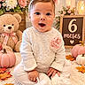 Angelina joined the competition — help win amazing prizes! baby, infant, child, sitting, portrait, smiling, happy, headband, floral_clothing, lace, teddy_bear, pumpkins, autumn_leaves, flowers, indoor, nursery, blanket, seasonal_decor, photography, six_months