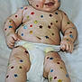 Roman is registered to the contest to win money with this photo: baby, infant, child, diaper, stars, stickers, smile, happy, cute, skin, legs, arms, face, toes, fingers, lying_down, blanket, soft, colorful, closeup