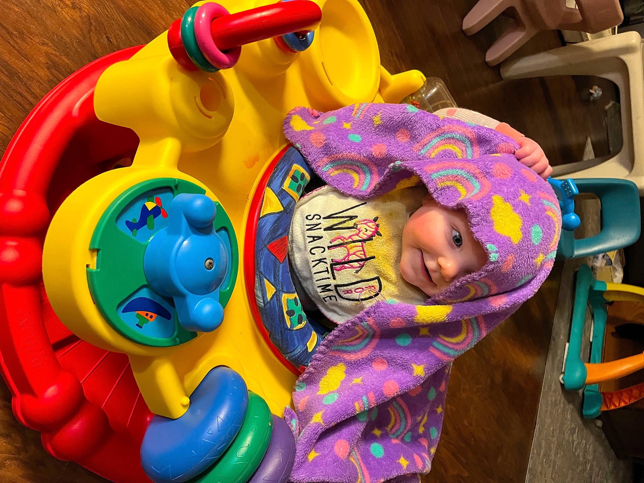 Allison is registered to the contest to win money with this photo: baby, baby_products, baby_toys, child, circle, fun, happy, hat, headwear, inflatable, joy, leisure, magenta, person, personal_protective_equipment, plastic, play, purple, recreation, snapshot