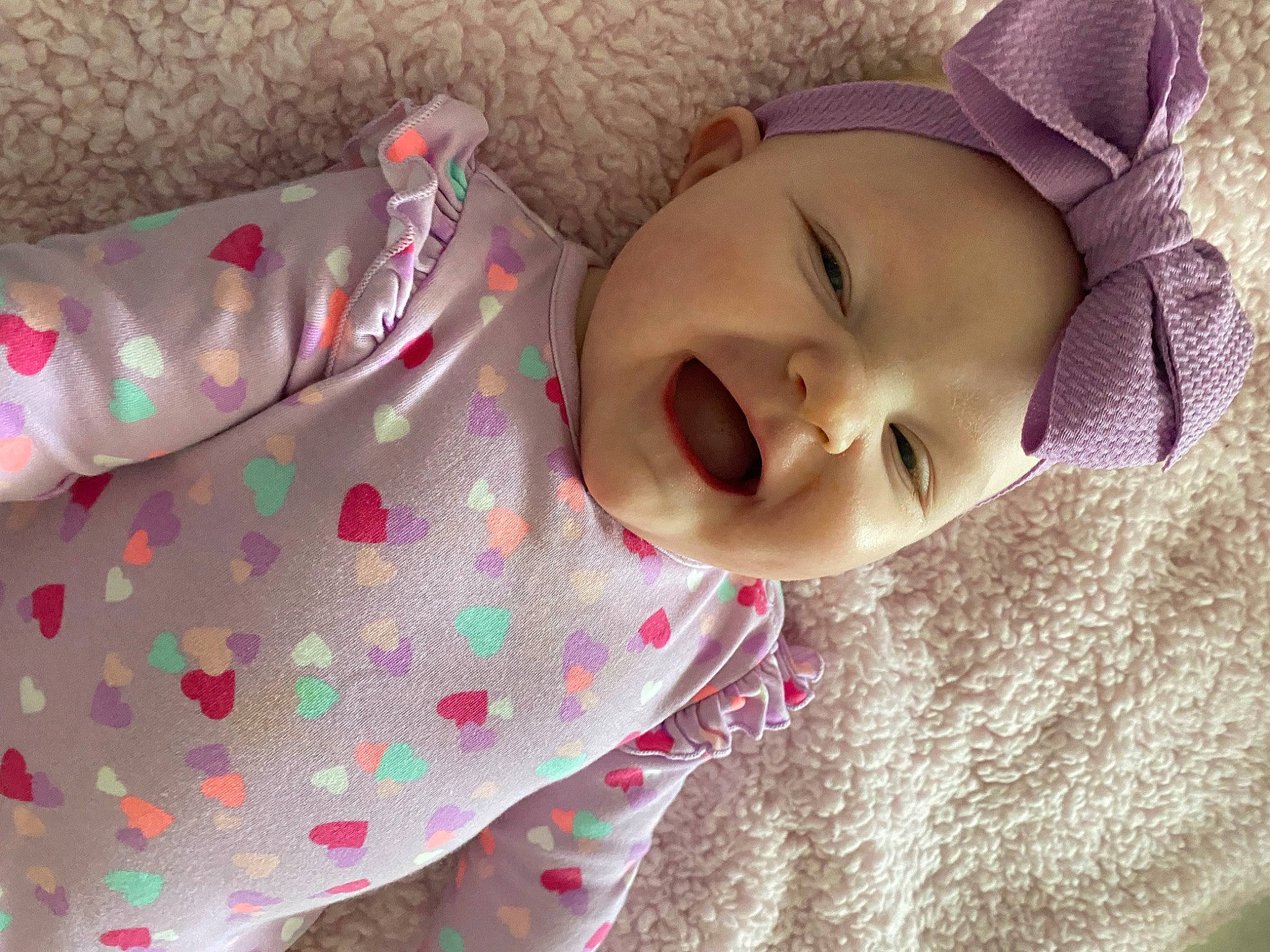 Allison is registered to the contest to win money with this photo: baby, baby_toddler_clothing, cheek, clothing, comfort, eye, grass, happy, headwear, iris, linens, lip, nose, person, pink, skin, sleeve, smile, textile, toddler