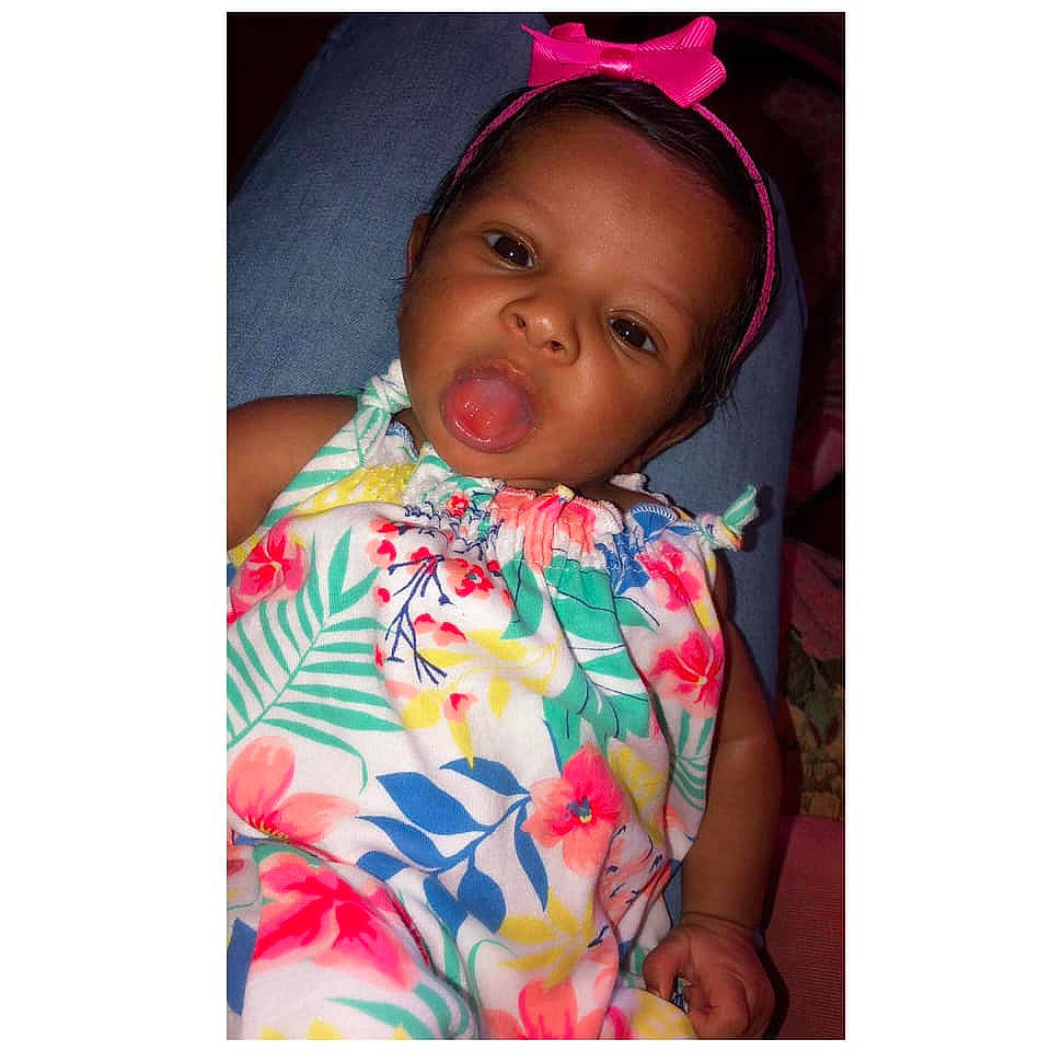 Caliese is registered to the contest to win money with this photo: baby, baby_products, beauty, cheek, child, dress, face, happy, head, headgear, lip, nose, person, pink, plant, play, product, skin, smile, textile