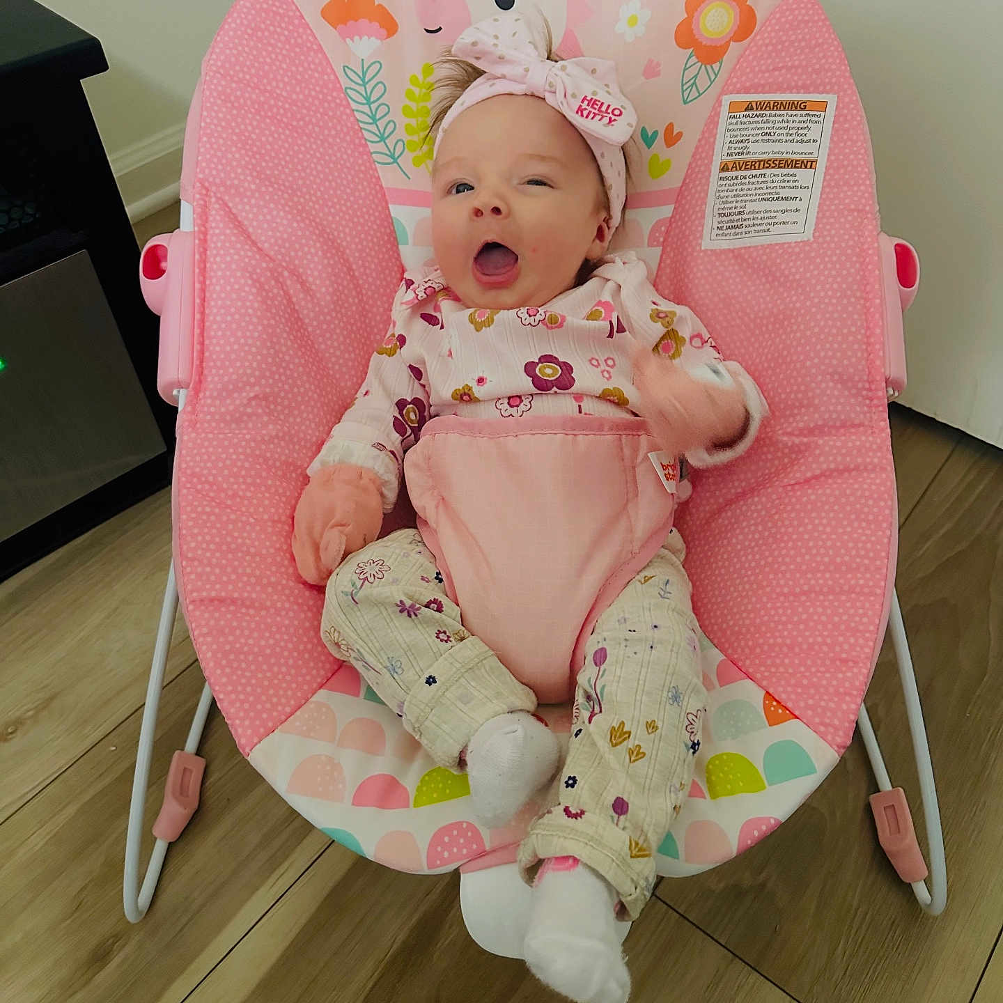 Ellani Raelynn joined the competition — help win amazing prizes! baby, baby_chair, child, colorful, cozy, cute, floral_pattern, happy, headband, hello_kitty, home, indoor, infant, pajamas, pink, seated, smiling, toy, unicorn, wooden_floor