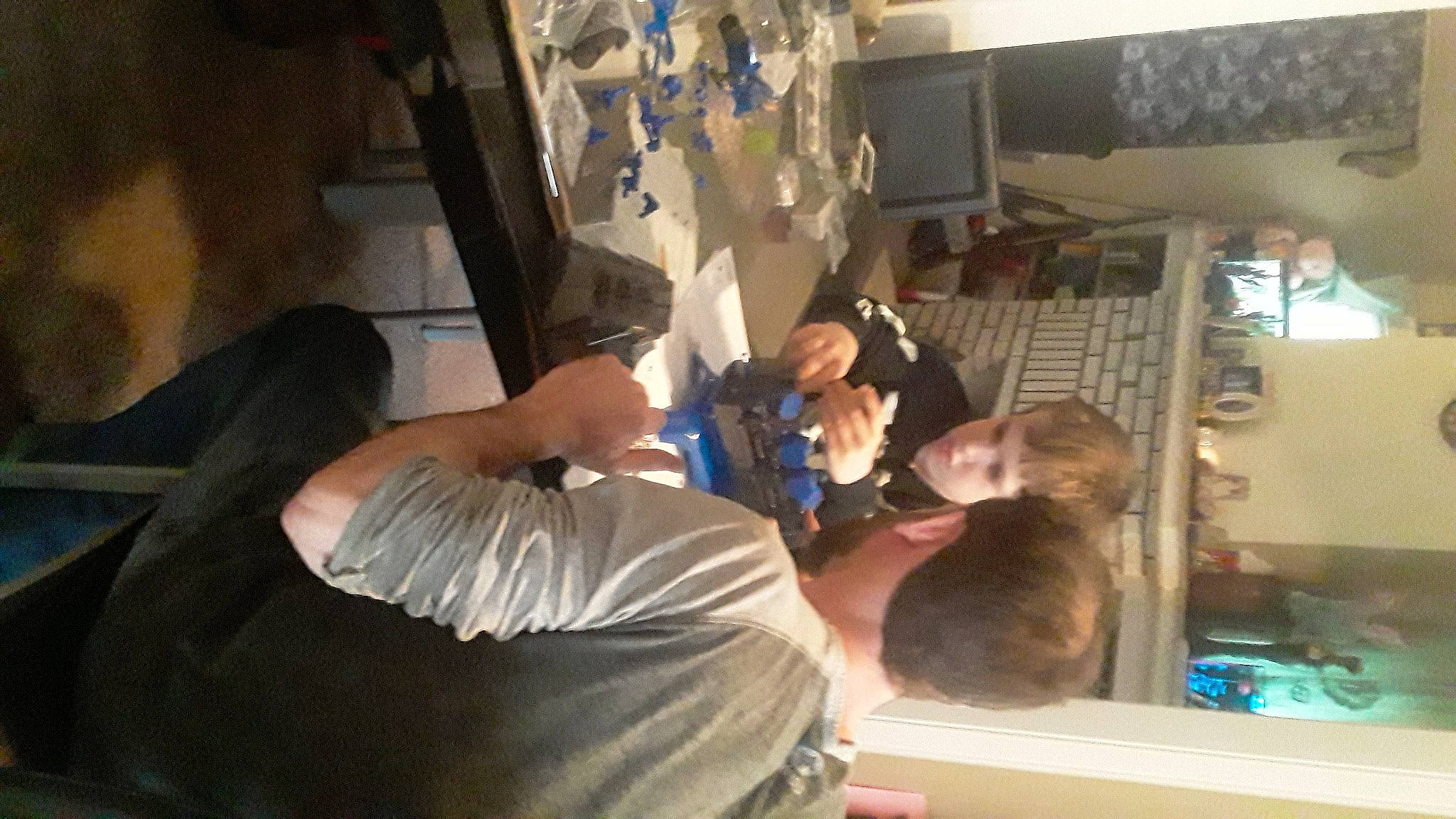 Tanner is registered to the contest to win money with this photo: elbow, engineering, event, fun, leisure, person, room, t_shirt, tree, wood, wrist