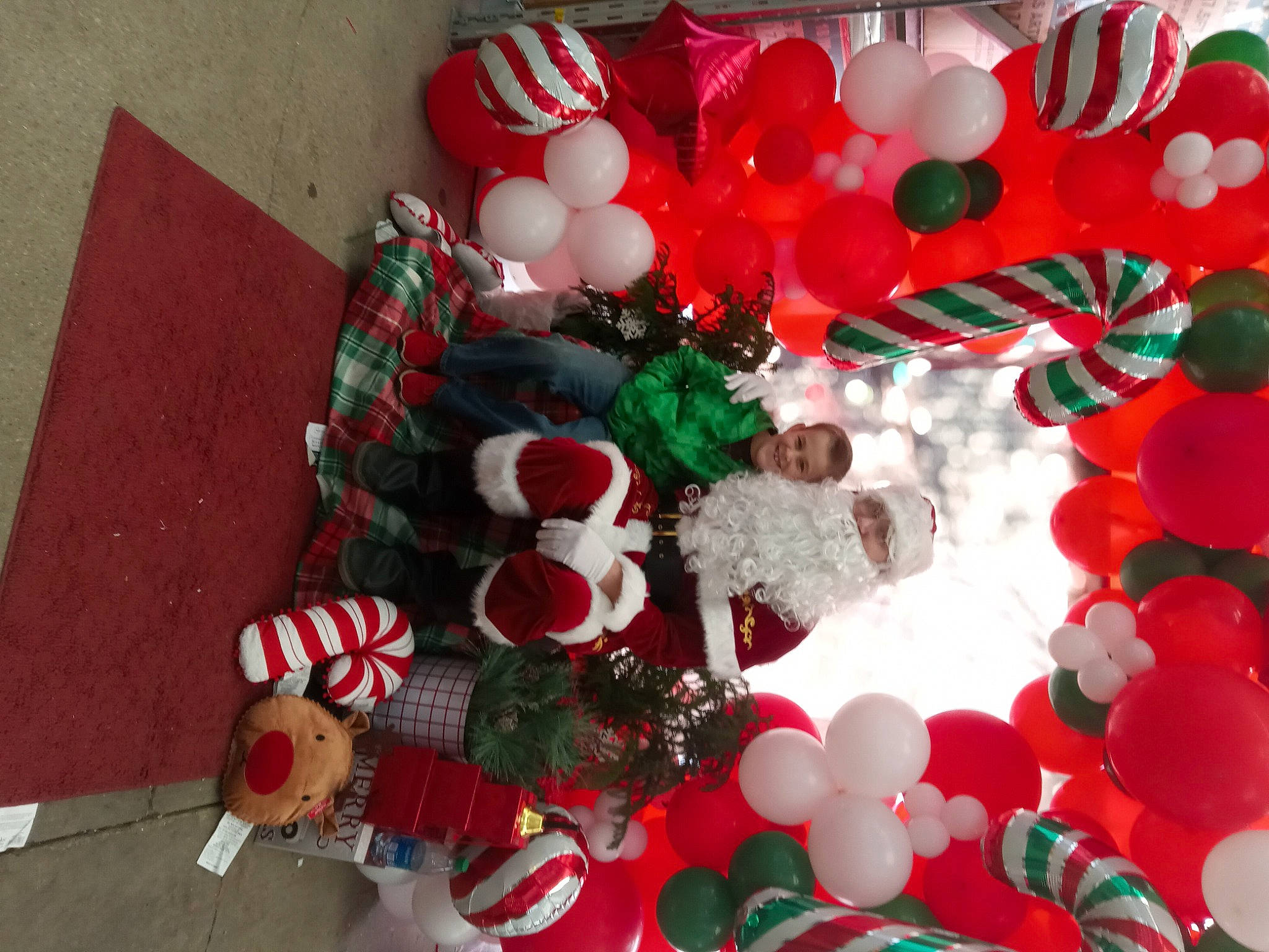 Tanner is registered to the contest to win money with this photo: balloon, carmine, christmas, christmas_decoration, christmas_eve, christmas_ornament, circle, decoration, event, headwear, holiday, holiday_ornament, interior_design, joy, ornament, party_supply, pattern, person, red, sweetness