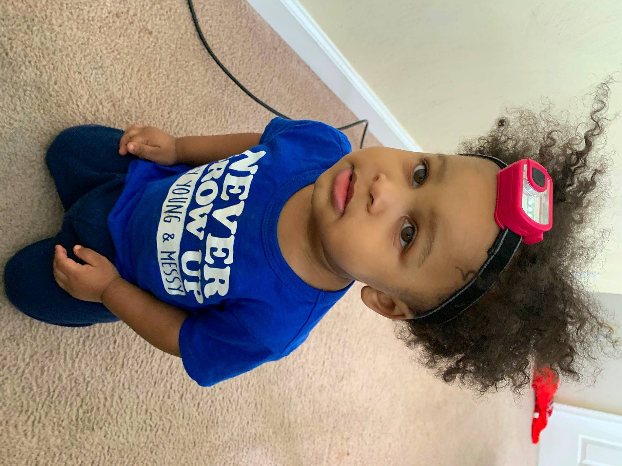 Noah is registered to the contest to win money with this photo: arm, black_hair, blue, child, costume, ear, electric_blue, forehead, head, headwear, lip, mouth, neck, nose, person, photography, skin, smile