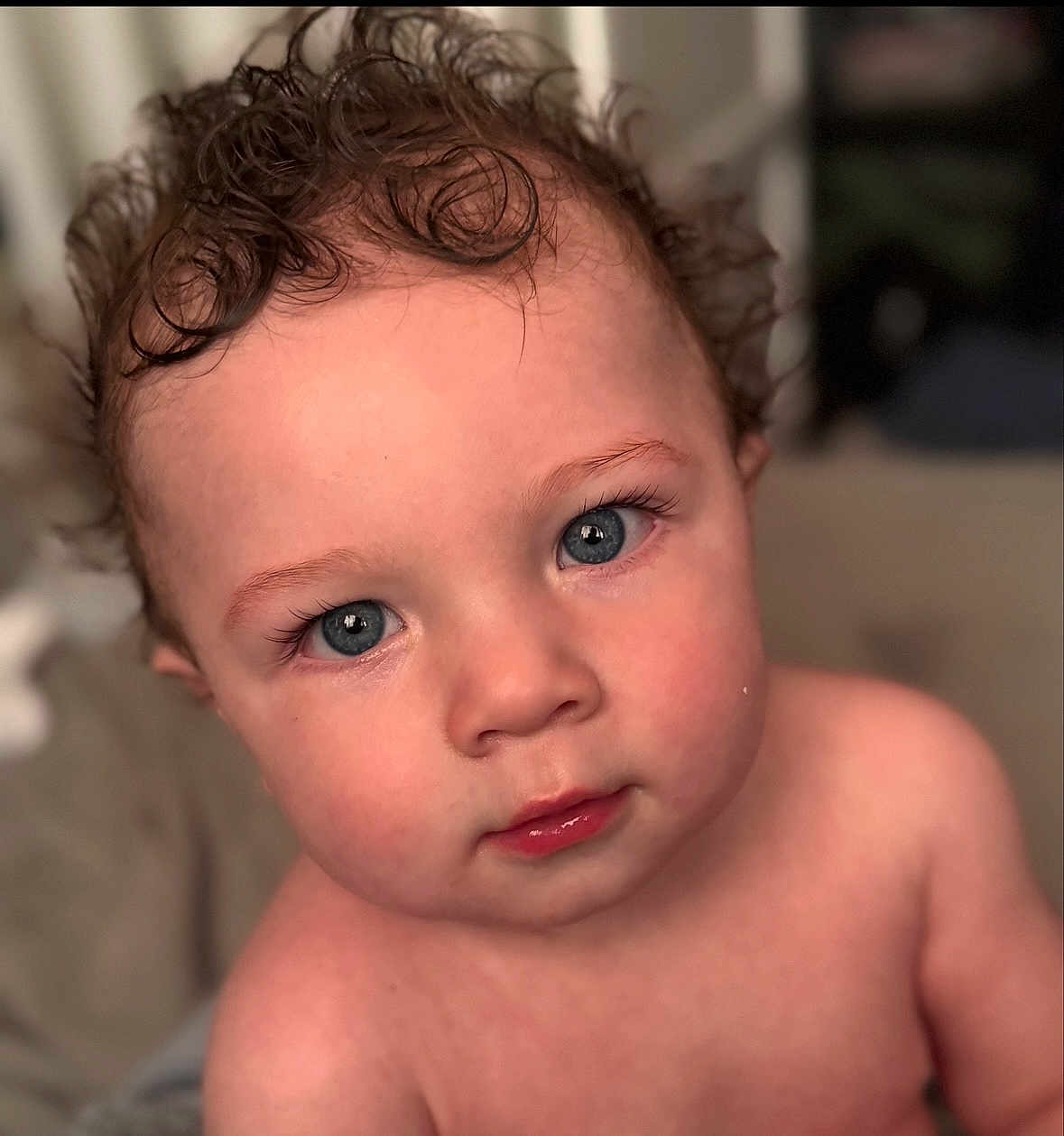 Reign joined the competition — help win amazing prizes! baby, child, closeup, portrait, blue_eyes, curly_hair, cute, innocent, skin, face, expression, young, natural_light, indoor, soft_focus, person, toddler, looking, head_and_shoulders, adorable