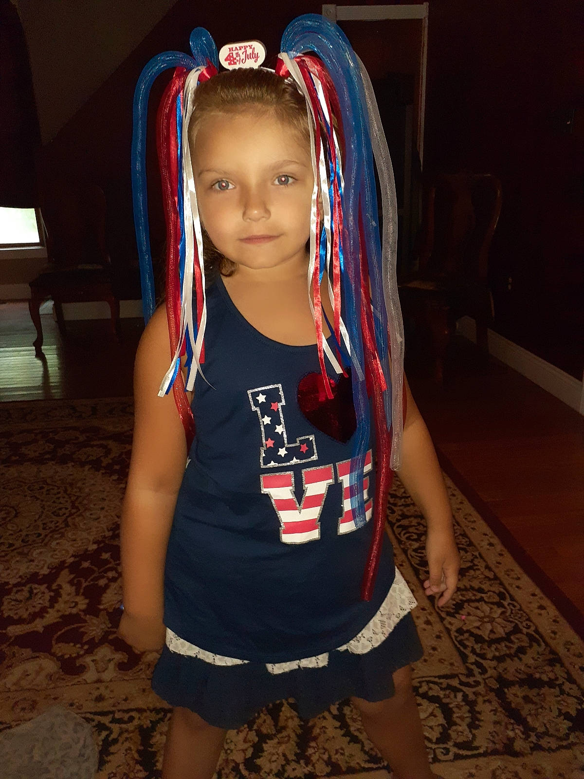 Kaitlyn is registered to the contest to win money with this photo: blue, child, cool, fun, hair, hairstyle, long_hair, person, t_shirt, toddler, vacation