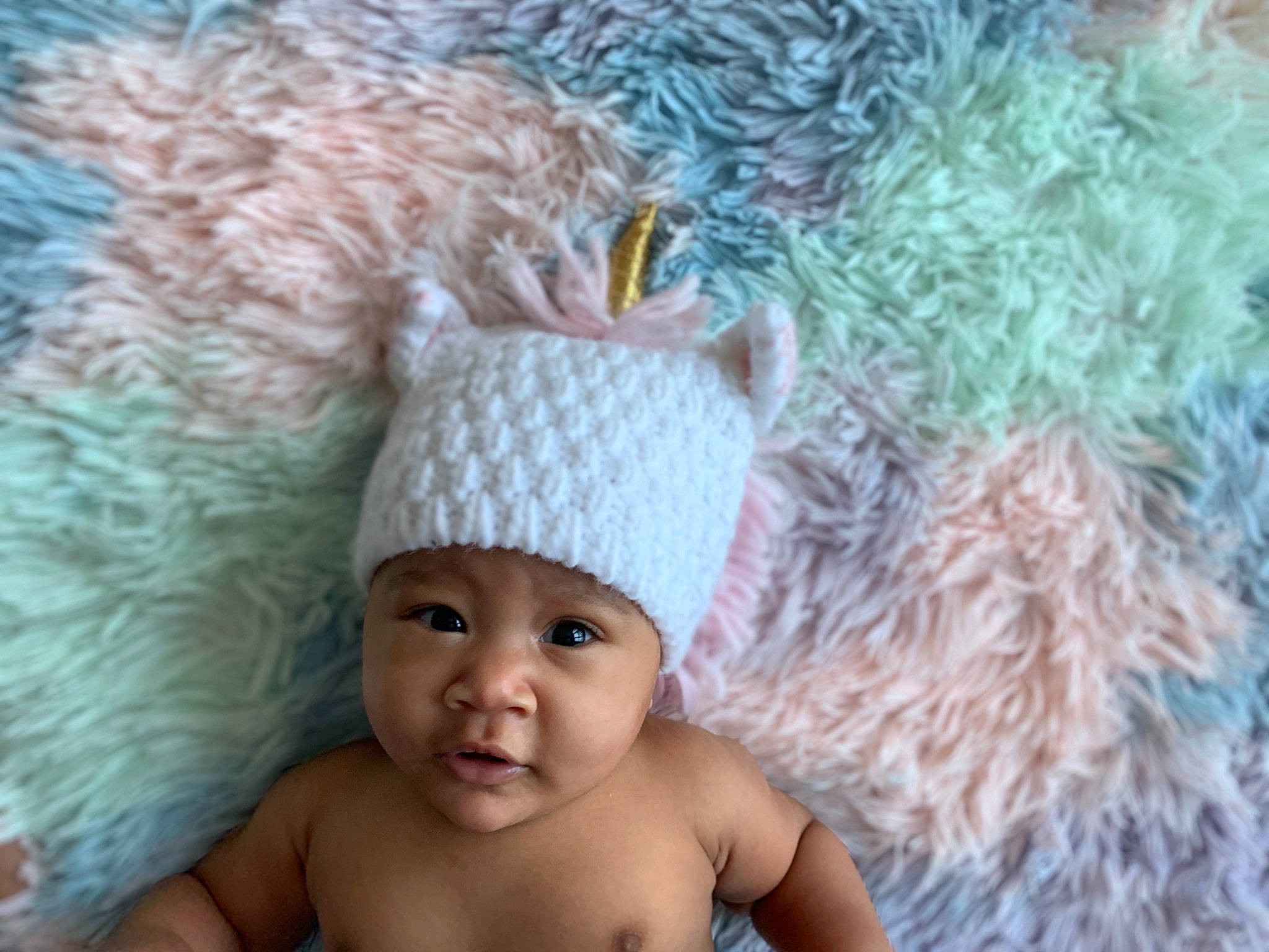 Cassie is registered to the contest to win money with this photo: baby, beanie, bonnet, cap, child, costume_accessory, crochet, fashion_accessory, hat, headgear, headwear, knit_cap, knitting, person, toddler, turquoise, wool