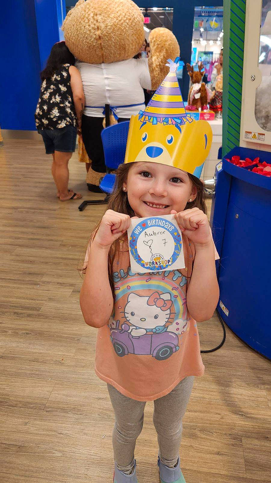Aubree is registered to the contest to win money with this photo: baby, baby_toddler_clothing, blue, child, costume, electric_blue, event, fashion_accessory, flooring, fun, happy, headwear, joy, leisure, party_supply, person, recreation, room, shorts, smile