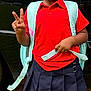 Eliyah joined the competition — help win amazing prizes! child, girl, red_shirt, skirt, backpack, peace_sign, black_car, grass, sidewalk, knee_socks, black_shoes, hairstyle, outdoor, pout, playful, standing, earrings, young, casual_clothing, daylight