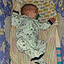 Jason joined the competition — help win amazing prizes! baby, sleeping, pajamas, dog_pattern, blanket, crib, knitted_blanket, pacifier, infant, child, cute, cozy, sleep, bed, soft, fabric, pattern, animal_print, colorful, resting