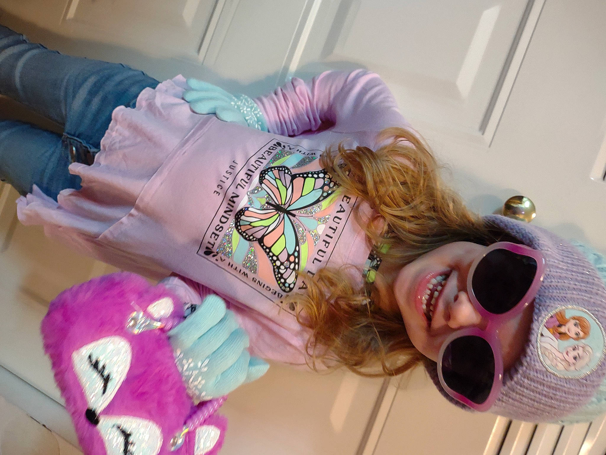 Katerina is registered to the contest to win money with this photo: arm, comfort, cool, eyelash, eyewear, finger, glasses, goggles, happy, headwear, joy, leg, mouth, person, pink, purple, skin, sleeve, smile, sunglasses