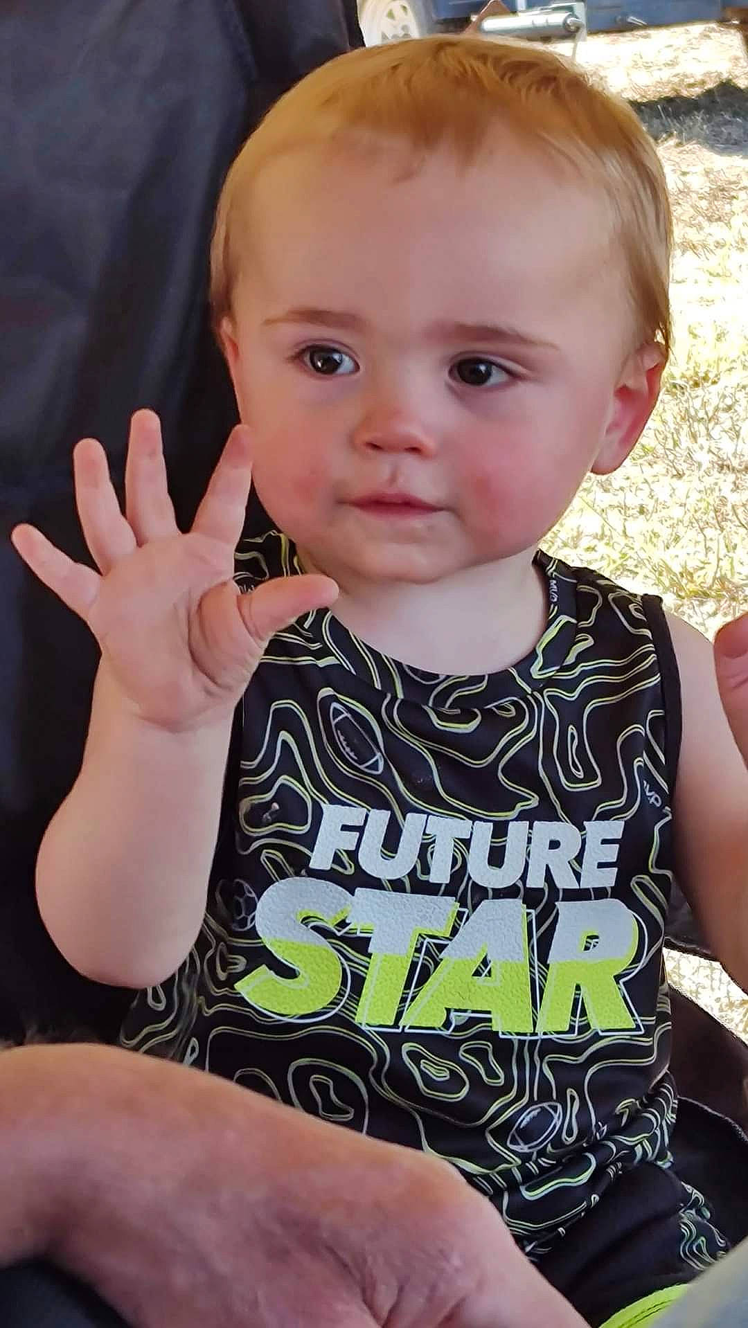 Kol joined the competition — help win amazing prizes! baby_toddler_clothing, cheek, chin, cool, eyelash, facial_expression, finger, gesture, hairstyle, hand, happy, head, human_body, mouth, neck, organ, person, skin, sleeve, t_shirt