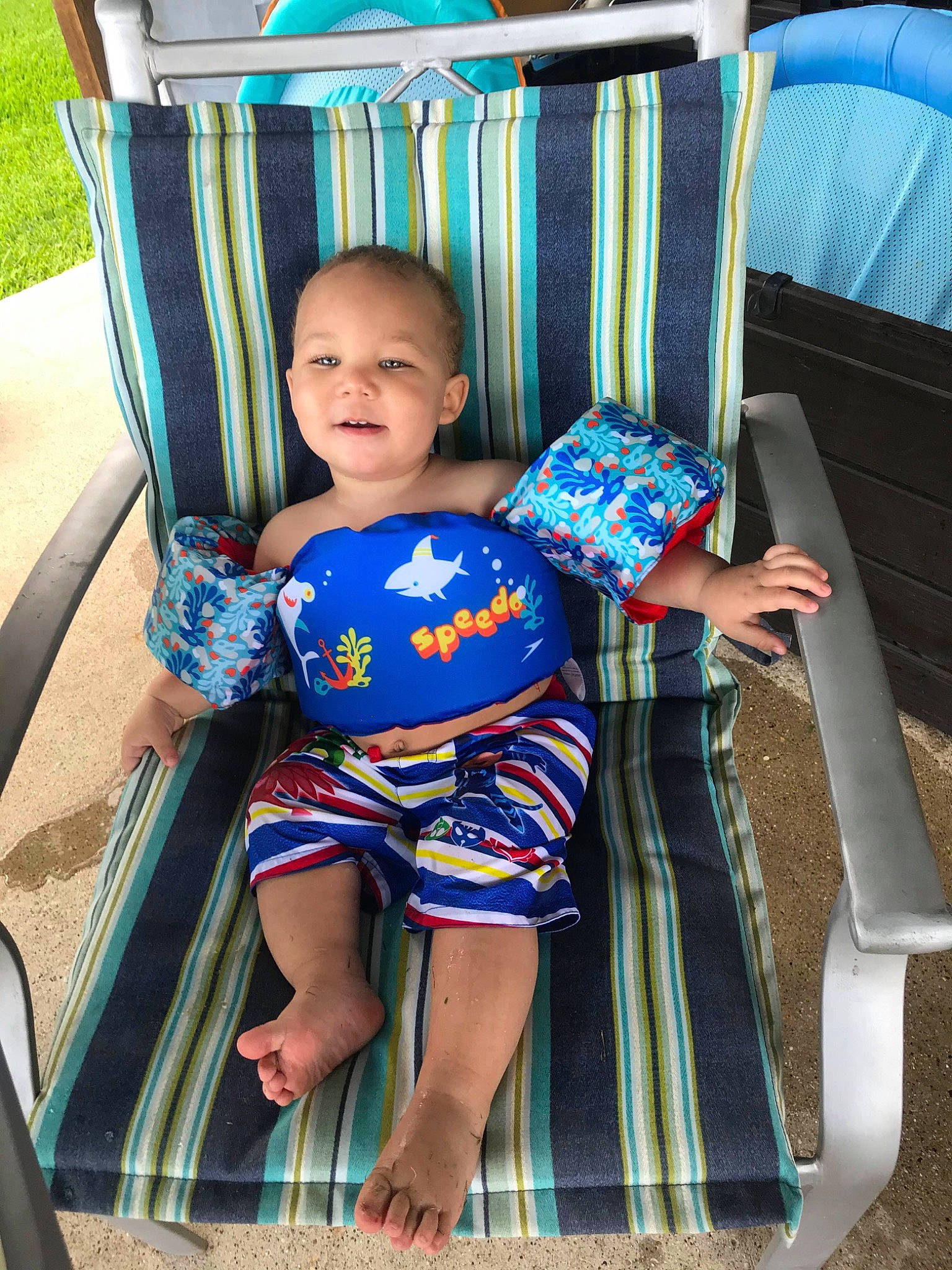 Kaleb joined the competition — help win amazing prizes! baby, baby_products, baby_toddler_clothing, chair, child, furniture, pattern, person, product, sitting, summer, textile, toddler, vacation