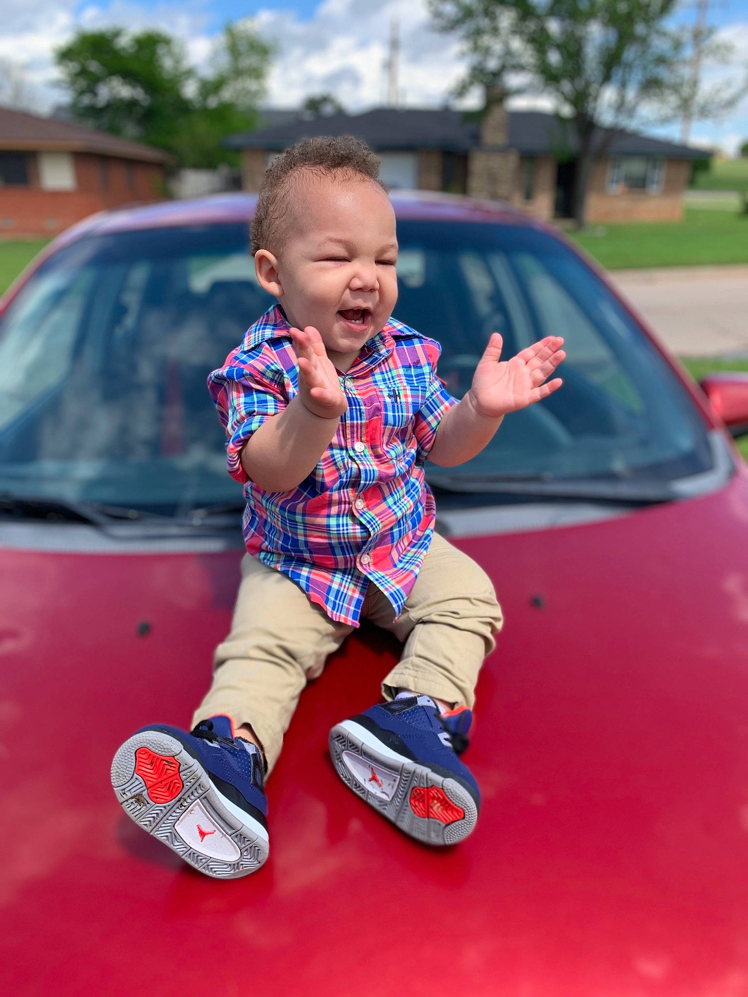 Kaleb is registered to the contest to win money with this photo: auto_part, automotive_window_part, baby, car, child, cool, family_car, fun, glass, happy, hood, motor_vehicle, person, photography, play, red, smile, toddler, vehicle, vehicle_door