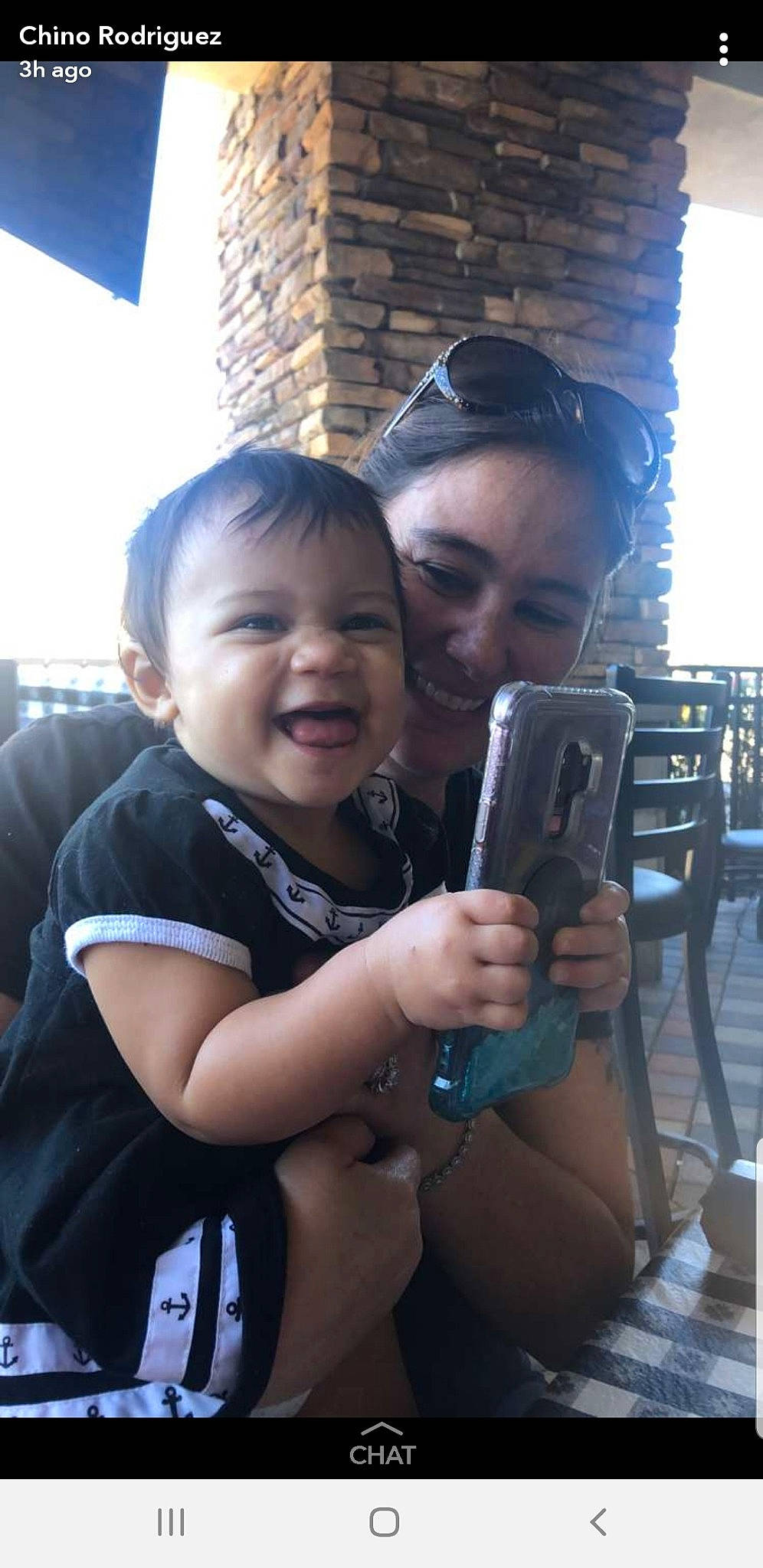 Emiliana is registered to the contest to win money with this photo: camera, child, daughter, fun, person, photography, selfie, smile, snapshot, vacation